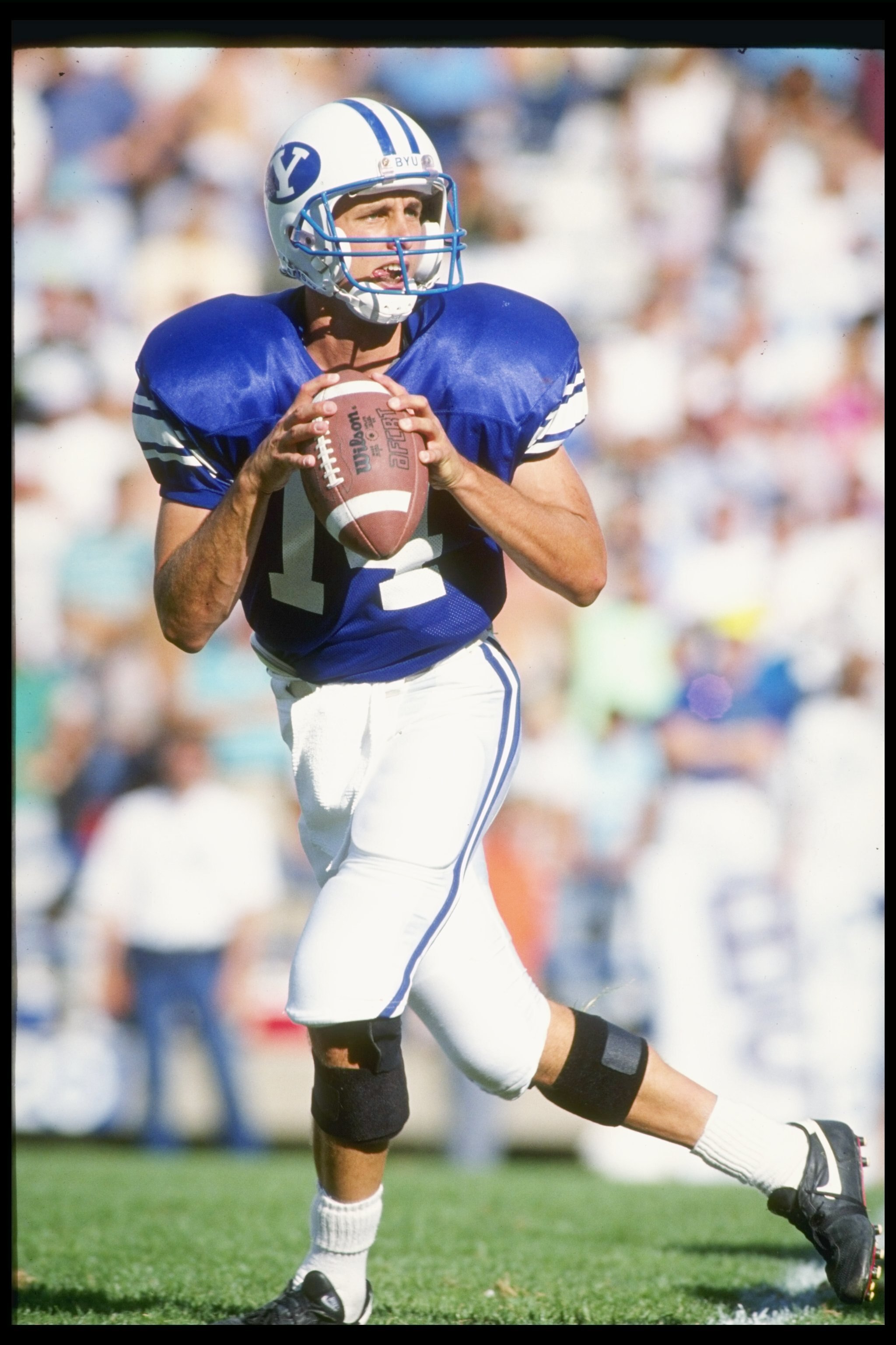 22 Sep 1990:  Quarterback Ty Detmer of the Brigham Young Cougars drops back to pass during a game against the San Diego State Aztecs at Cougar Stadium in Provo, Utah.  Brigham Young won the game 62-34. Mandatory Credit: Mike Powell  /Allsport