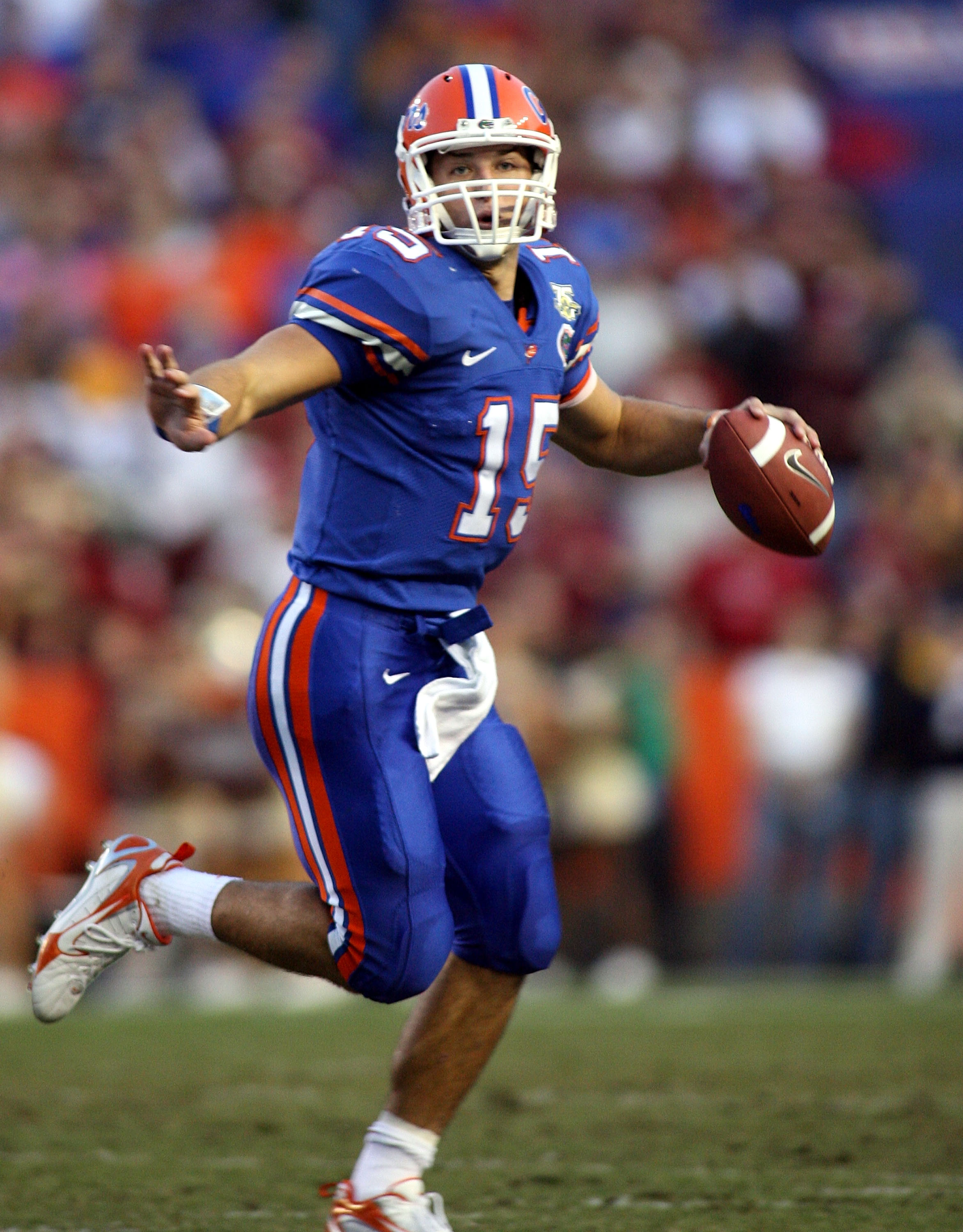 GAINESVILLE, FL - NOVEMBER 24:  Quarterback Tim Tebow #15 of the Florida Gators rolls out against the Florida State Seminoles at Ben Hill Griffin Stadium November 24, 2007 in Gainesville, Florida.  (Photo by Marc Serota/Getty Images)