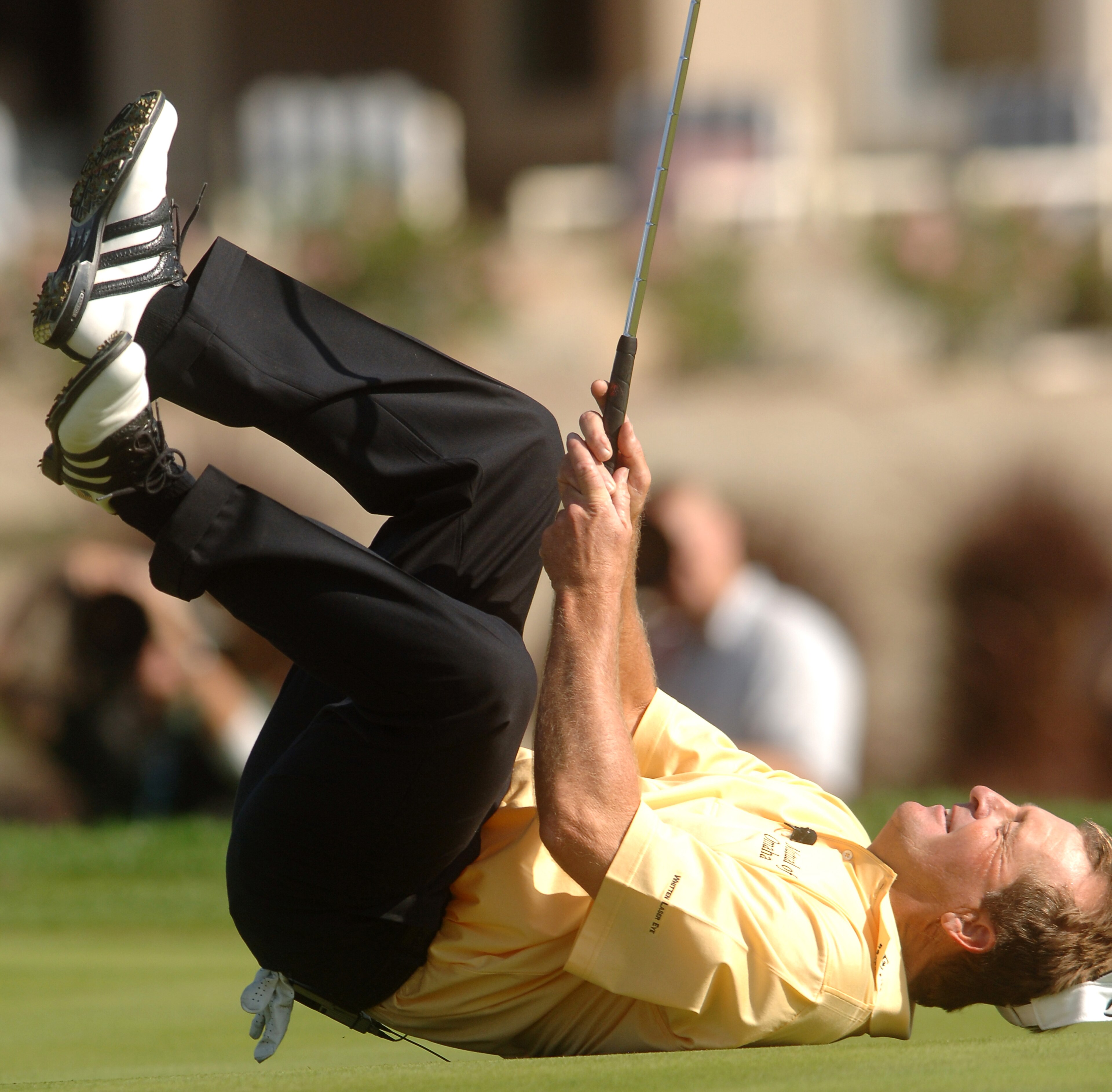 UNITED STATES - NOVEMBER 26:  Fred Funk falls to the ground after missing a birdie attempt on the seventh green the Merrill Lynch Skins Game at Trilogy Golf Club at La Quinta in La Quinta, California November 26, 2005.  (Photo by Steve Grayson/Getty Image