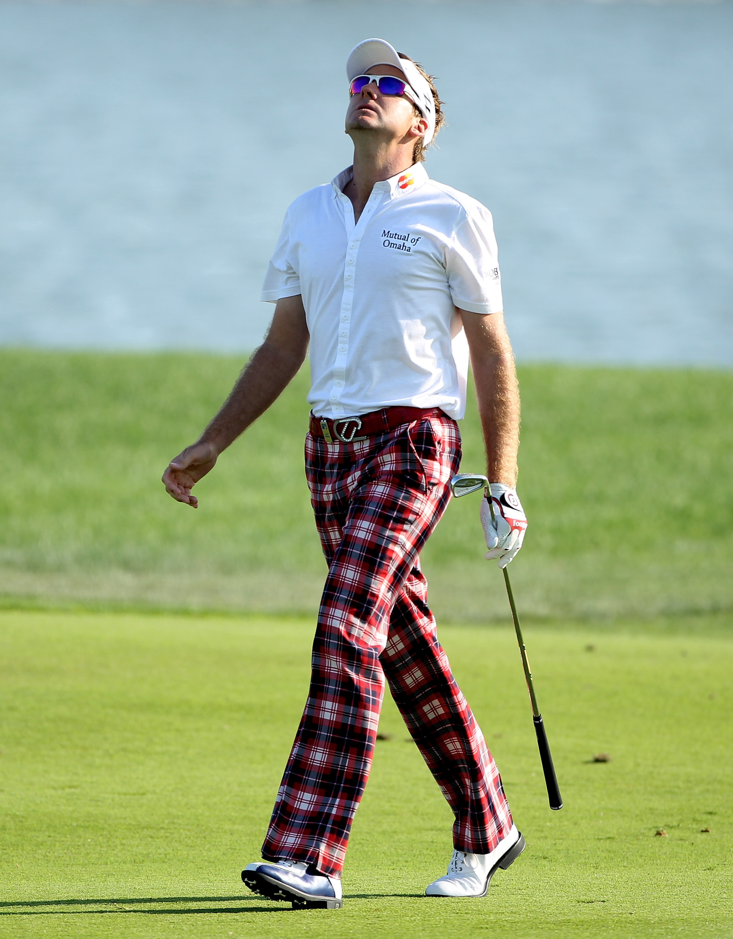 ABU DHABI, UNITED ARAB EMIRATES - JANUARY 24:  Ian Poulter of England looks frustrated after his second shot on the 17th hole during the final round of The Abu Dhabi Golf Championship at Abu Dhabi Golf Club on January 24, 2010 in Abu Dhabi, United Arab Em