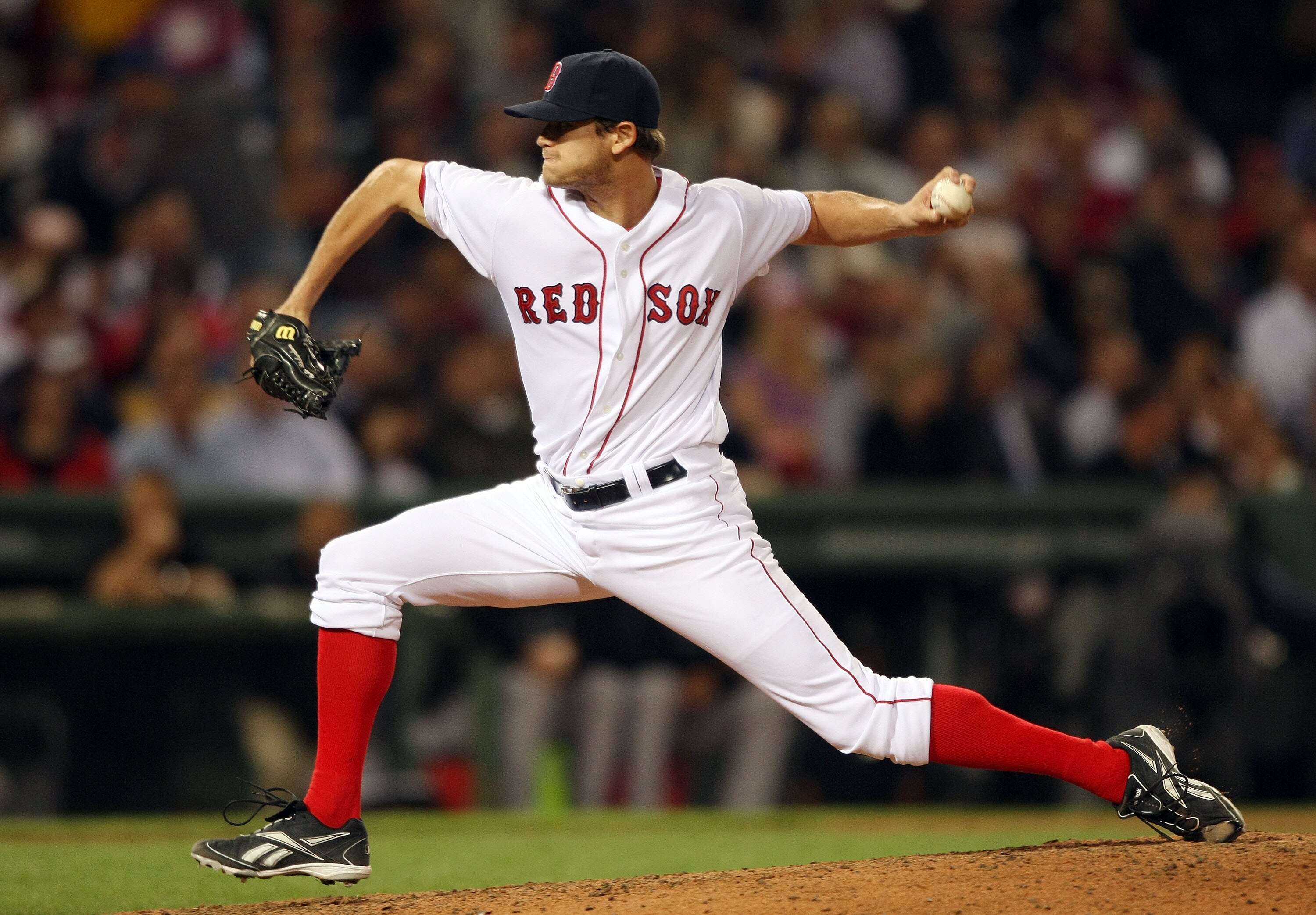 BOSTON - SEPTEMBER 28:  Dustin Richardson #54 of the Boston Red Sox delivers a pitch in the seventh inning against the Toronto Blue Jays on September 28, 2009 at Fenway Park in Boston, Massachusetts.  (Photo by Elsa/Getty Images)