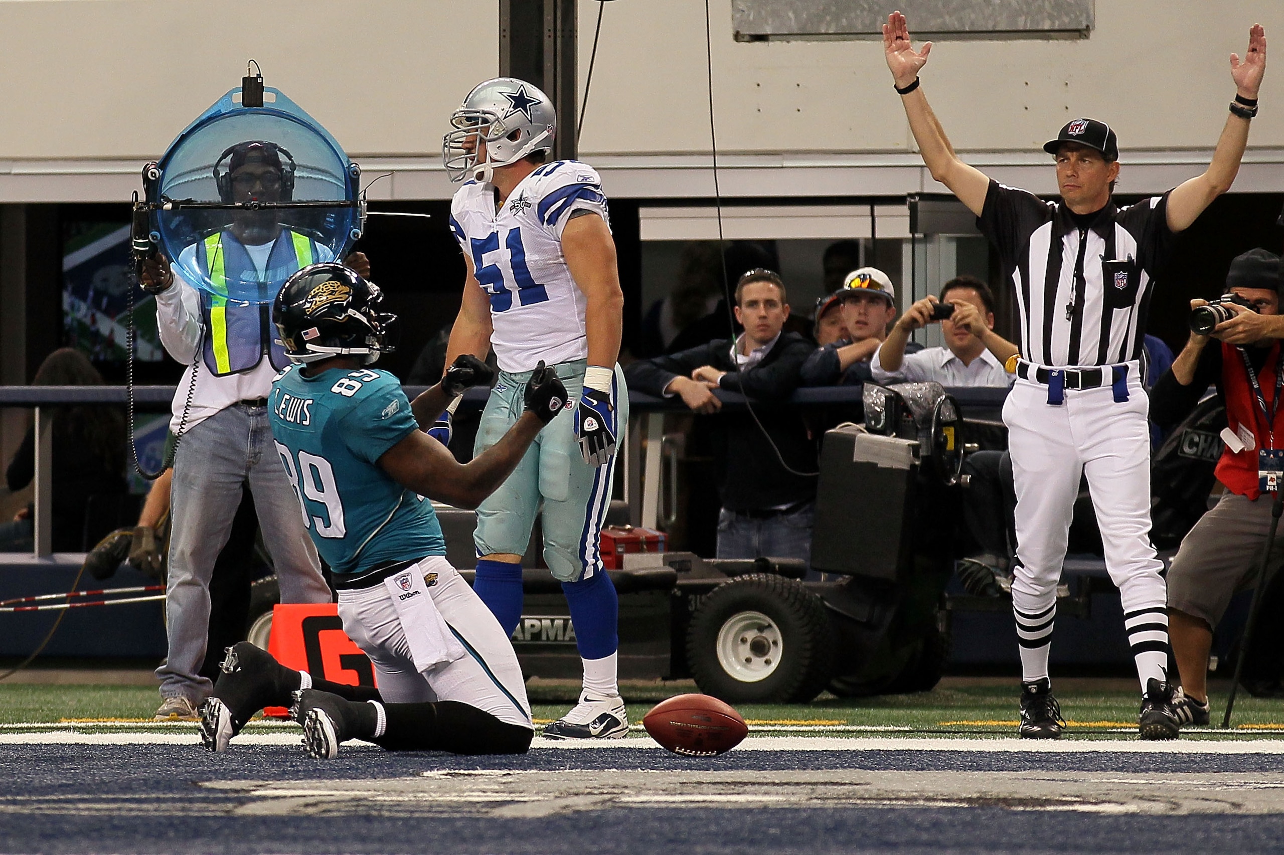 ARLINGTON, TX - OCTOBER 31:  Marcedes Lewis #89 of the Jacksonville Jaguars reacts after he scored a 9-yard touchdown reception in the third quarter against Keith Brooking #51 of the Dallas Cowboys at Cowboys Stadium on October 31, 2010 in Arlington, Texa