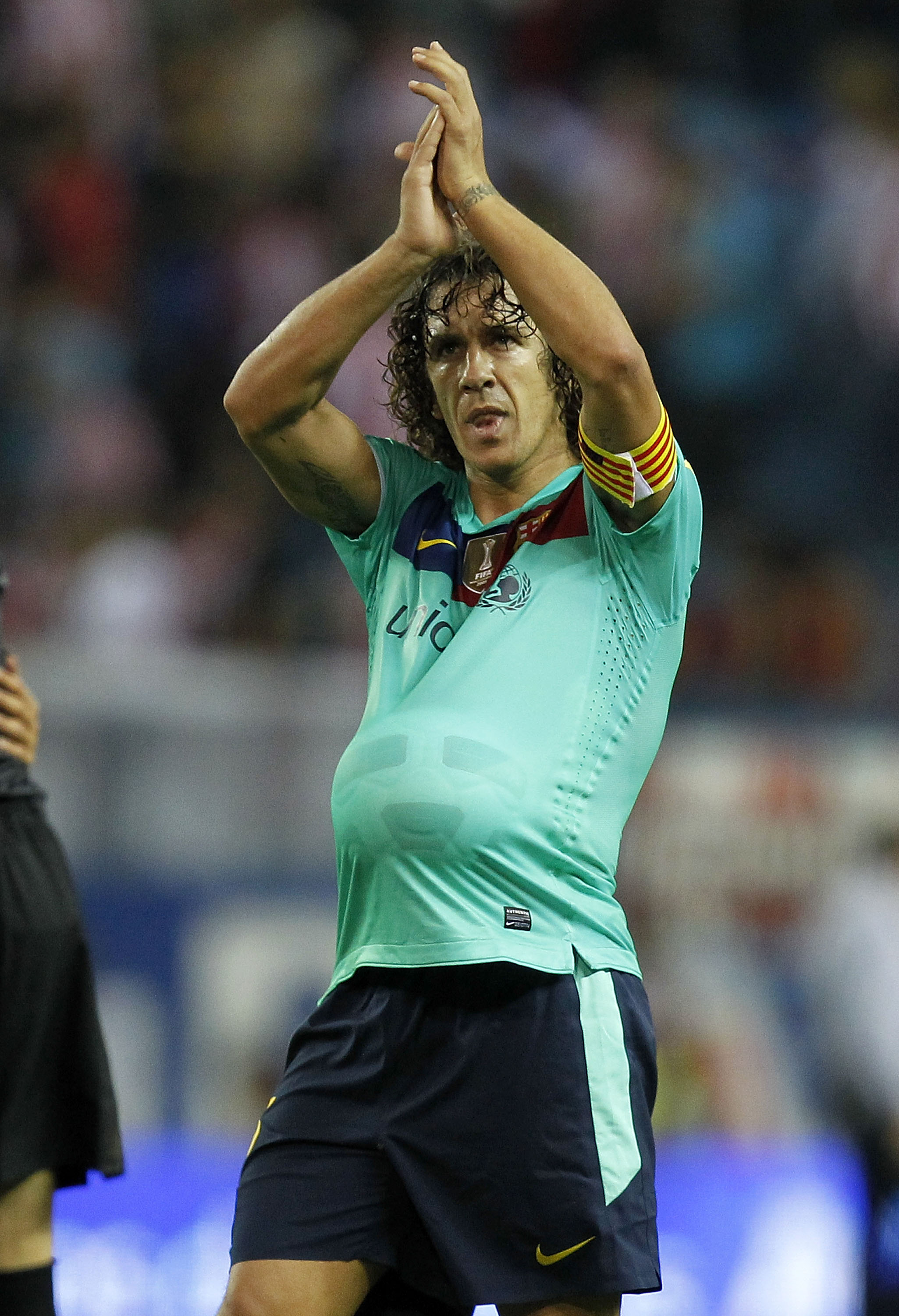 MADRID, SPAIN - SEPTEMBER 19: Carles Puyol of Barcelona celebrates after the La Liga match between Atletico Madrid and Barcelona at Vicente Calderon Stadium on September 19, 2010 in Madrid, Spain.  (Photo by Angel Martinez/Getty Images)