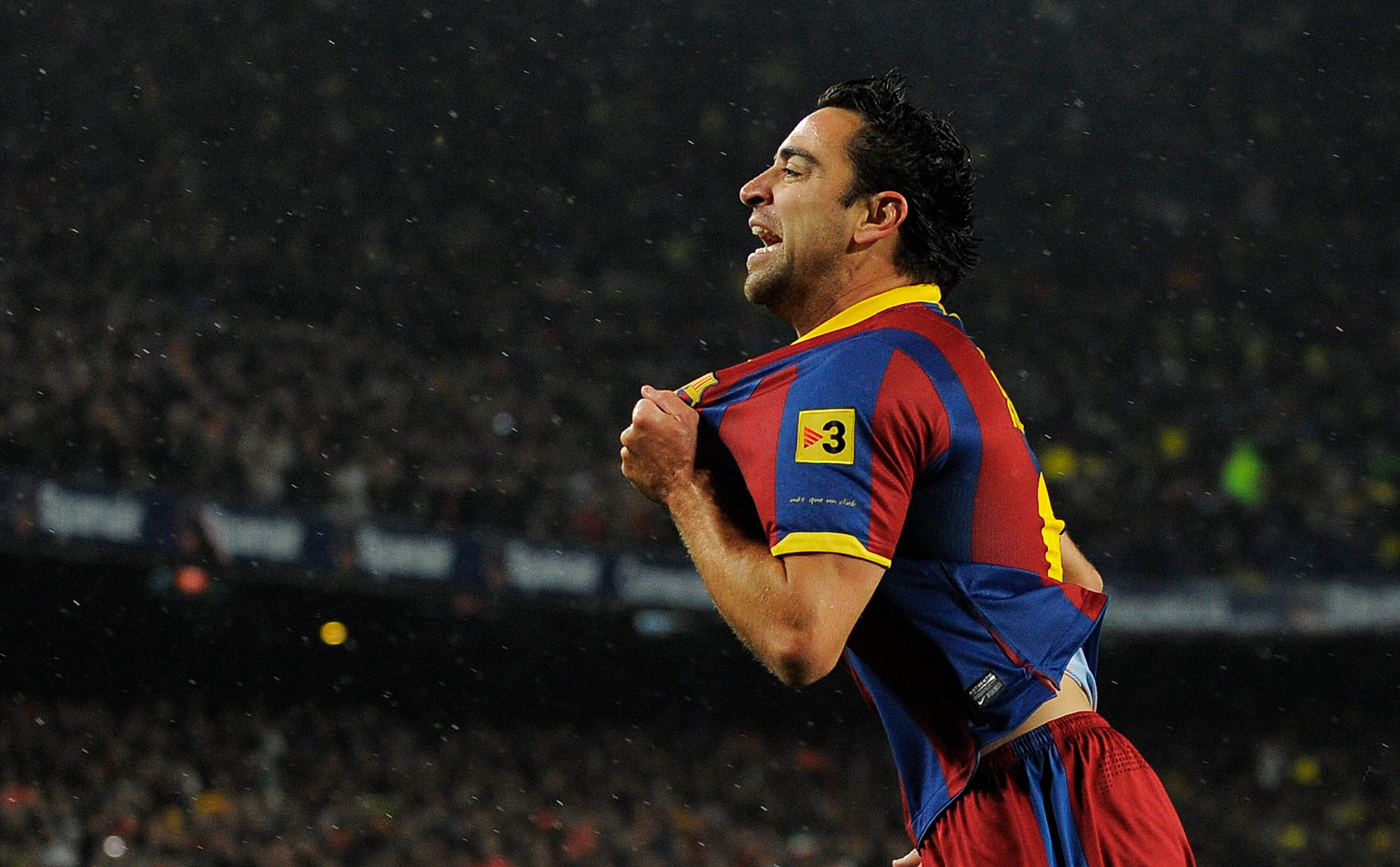 BARCELONA, SPAIN - NOVEMBER 29:  Xavi Hernandez of Barcelna celebrates after scoring the first goal during the La Liga match between Barcelona and Real Madrid at the Camp Nou Stadium on November 29, 2010 in Barcelona, Spain.  Barcelona won the match 5-0.