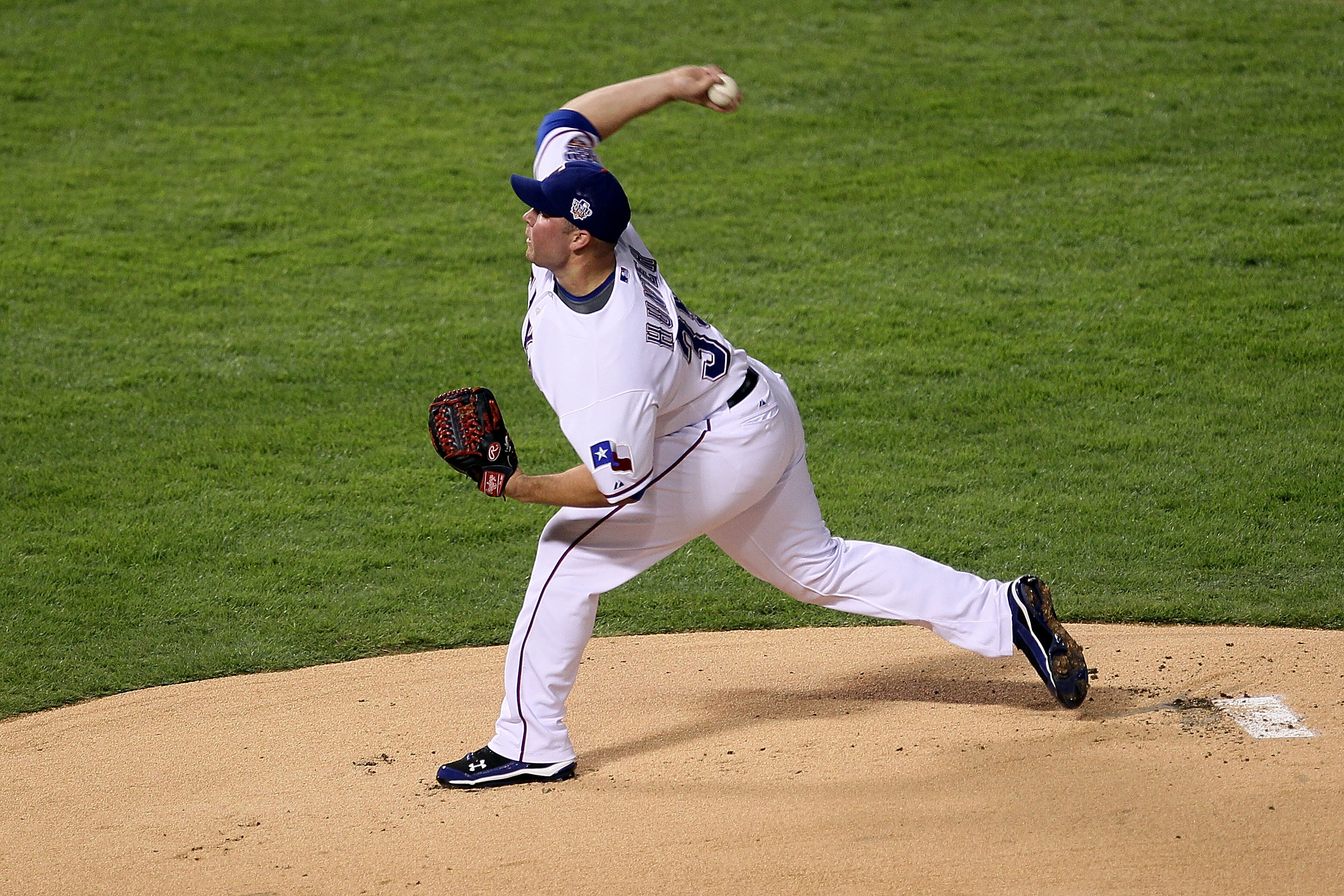 ARLINGTON, TX - OCTOBER 31:  Tommy Hunter #35 of the Texas Rangers pitches against the San Francisco Giants in Game Four of the 2010 MLB World Series at Rangers Ballpark in Arlington on October 31, 2010 in Arlington, Texas.  (Photo by Stephen Dunn/Getty I