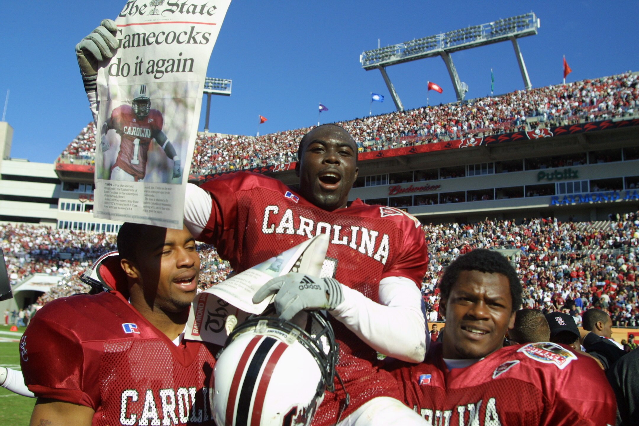 1 Jan 2002:  South Carolina player Antoine Nesmith, #1, is carried off the field by teammates after beating Ohio State 31-28 in the Outback Bowl at Raymond James Stadium in Tampa, Florida.  DIGITAL IMAGE. Mandatory Credit: Scott Halleran/Getty Images
