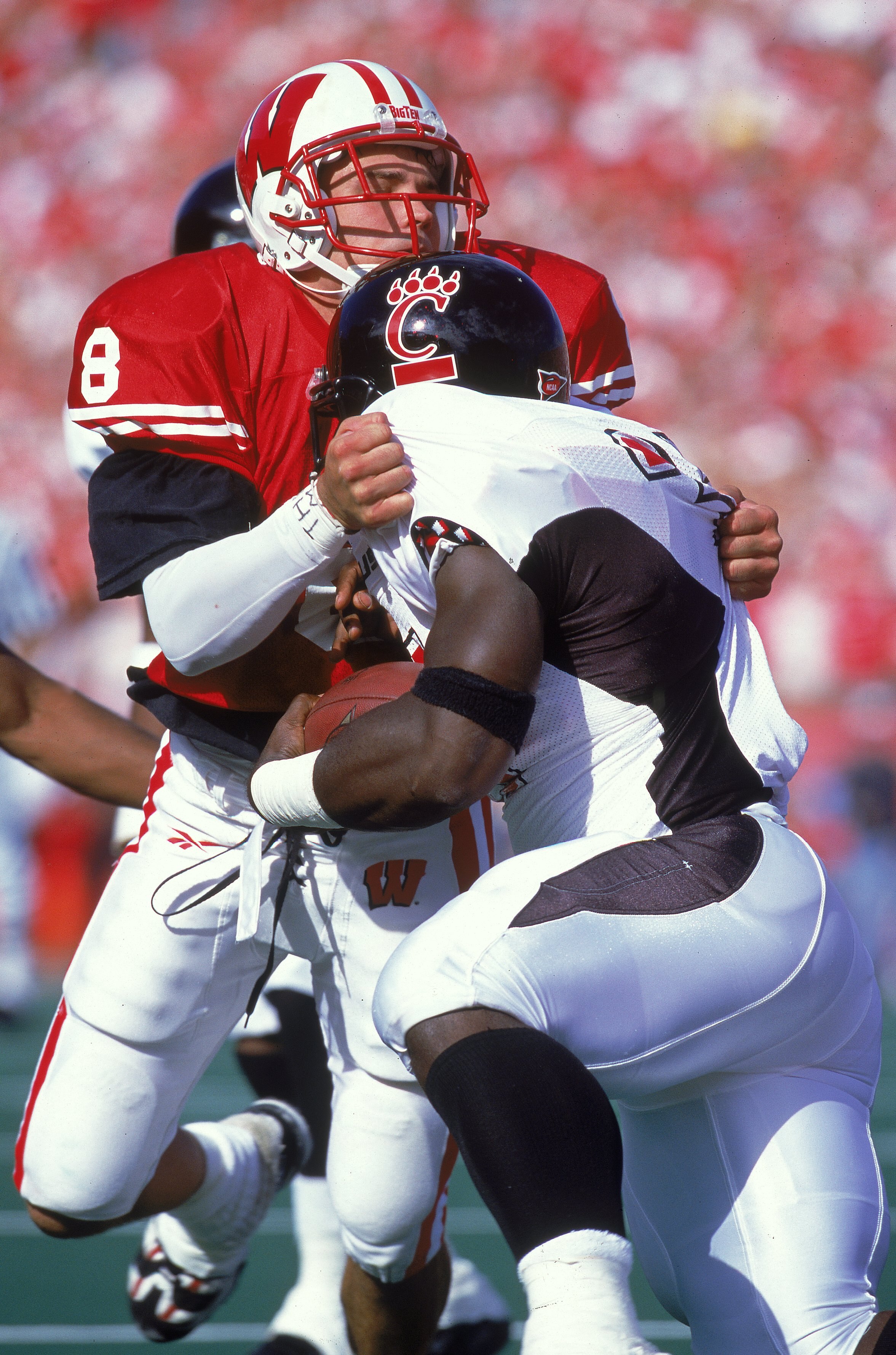 16 Sep 2000:  Jason Doering #8 of the Wisconsin Badgers holds on during the game against the Cincinnati Bearcats at the Camp Randall Stadium in Madison, Wisconsin. The Badgers defeated the Bearcats 28-25.Mandatory Credit: Tom Hauck  /Allsport