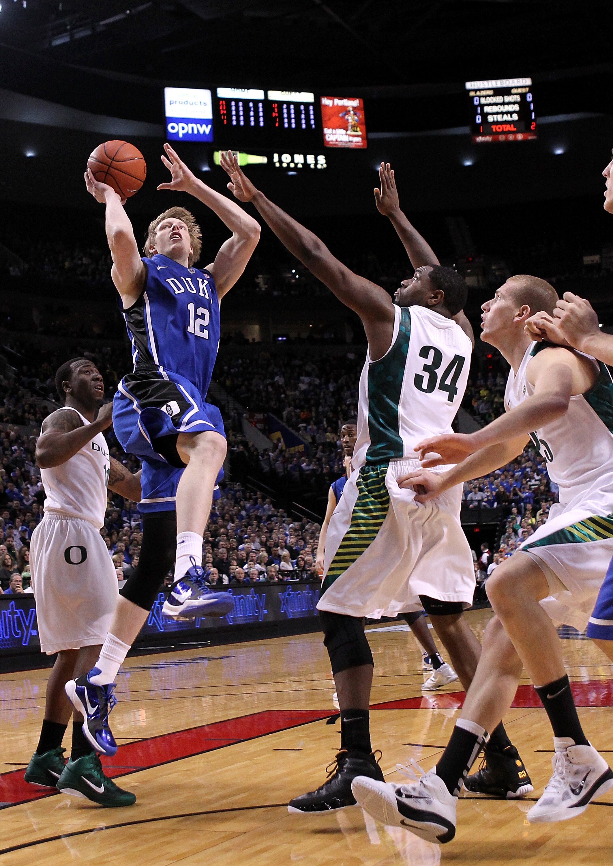 PORTLAND, OR - NOVEMBER 27:  Kyle Singler #12 of the Duke Blue Devils shoots  against the Oregon Ducks on November 27, 2010 at the Rose Garden in Portland, Oregon.  (Photo by Jonathan Ferrey/Getty Images)