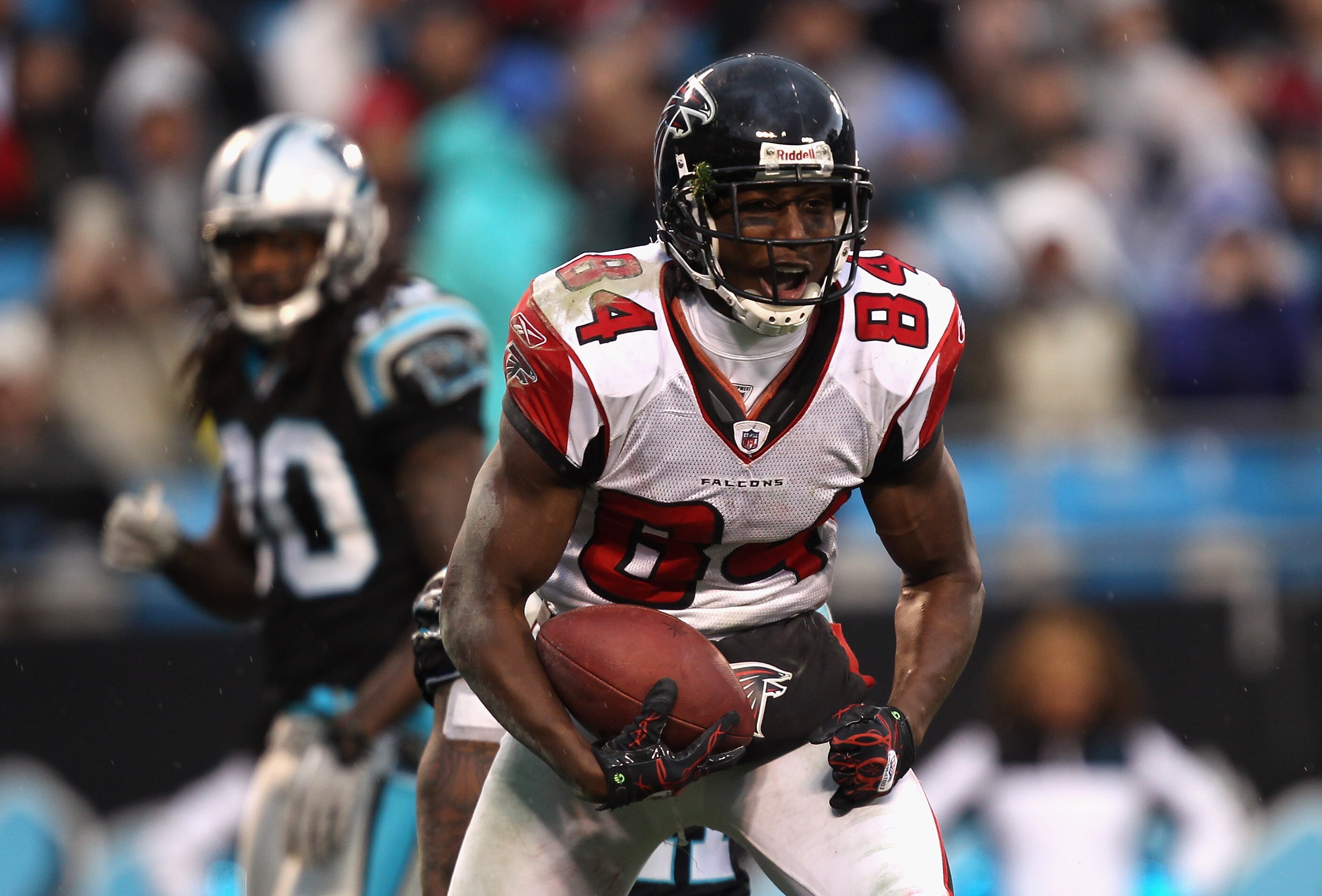 CHARLOTTE, NC - DECEMBER 12:  Roddy White #84 of the Atlanta Falcons reacts after making a catch against the Carolina Panthers during their game at Bank of America Stadium on December 12, 2010 in Charlotte, North Carolina.  (Photo by Streeter Lecka/Getty