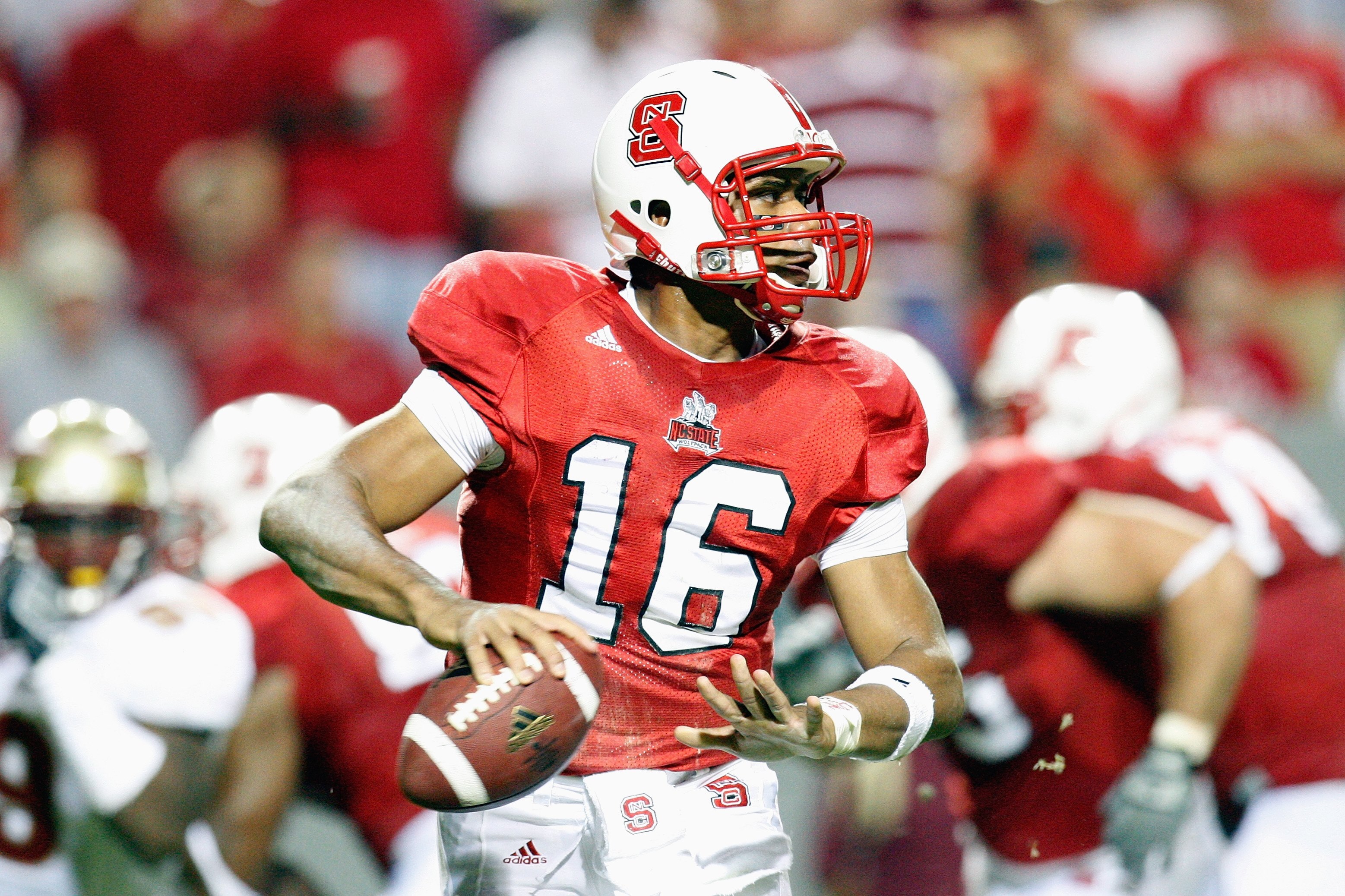 RALEIGH, NC - OCTOBER 16:  Russell Wilson #16 of the North Carolina State Wolfpack looks for a receiver during the game against the Florida State Seminoles at Carter-Finley Stadium on October 16, 2008 in Raleigh, North Carolina.  (Photo by Kevin C. Cox/Ge