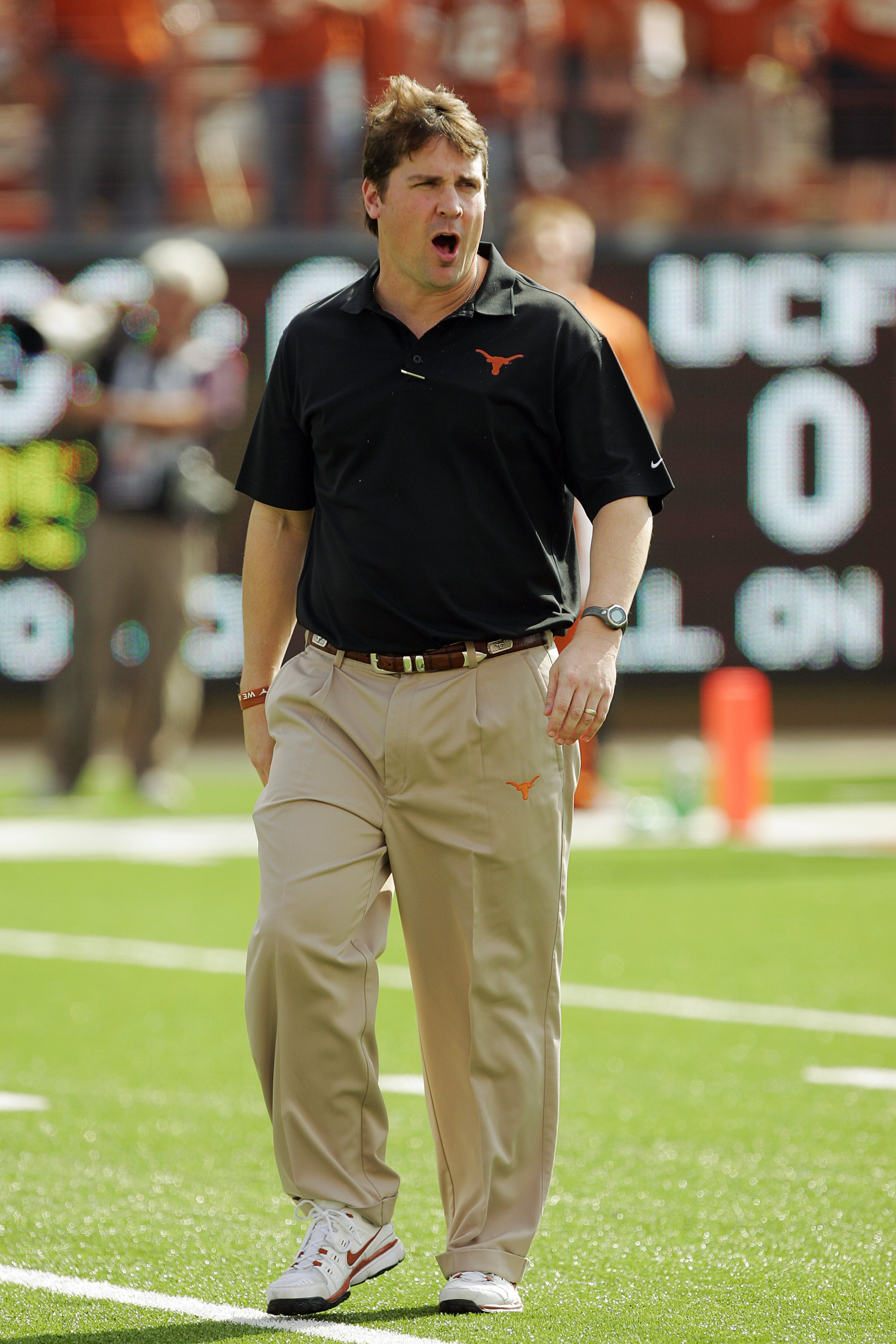 AUSTIN, TX - NOVEMBER 07:  Defensive coordinator Will Muschamp of the Texas Longhorns watches the defense prepare against the UCF Knights on November 7, 2009 at Darrell K Royal - Texas Memorial Stadium in Austin, Texas.  Texas won 35-3.  (Photo by Brian B