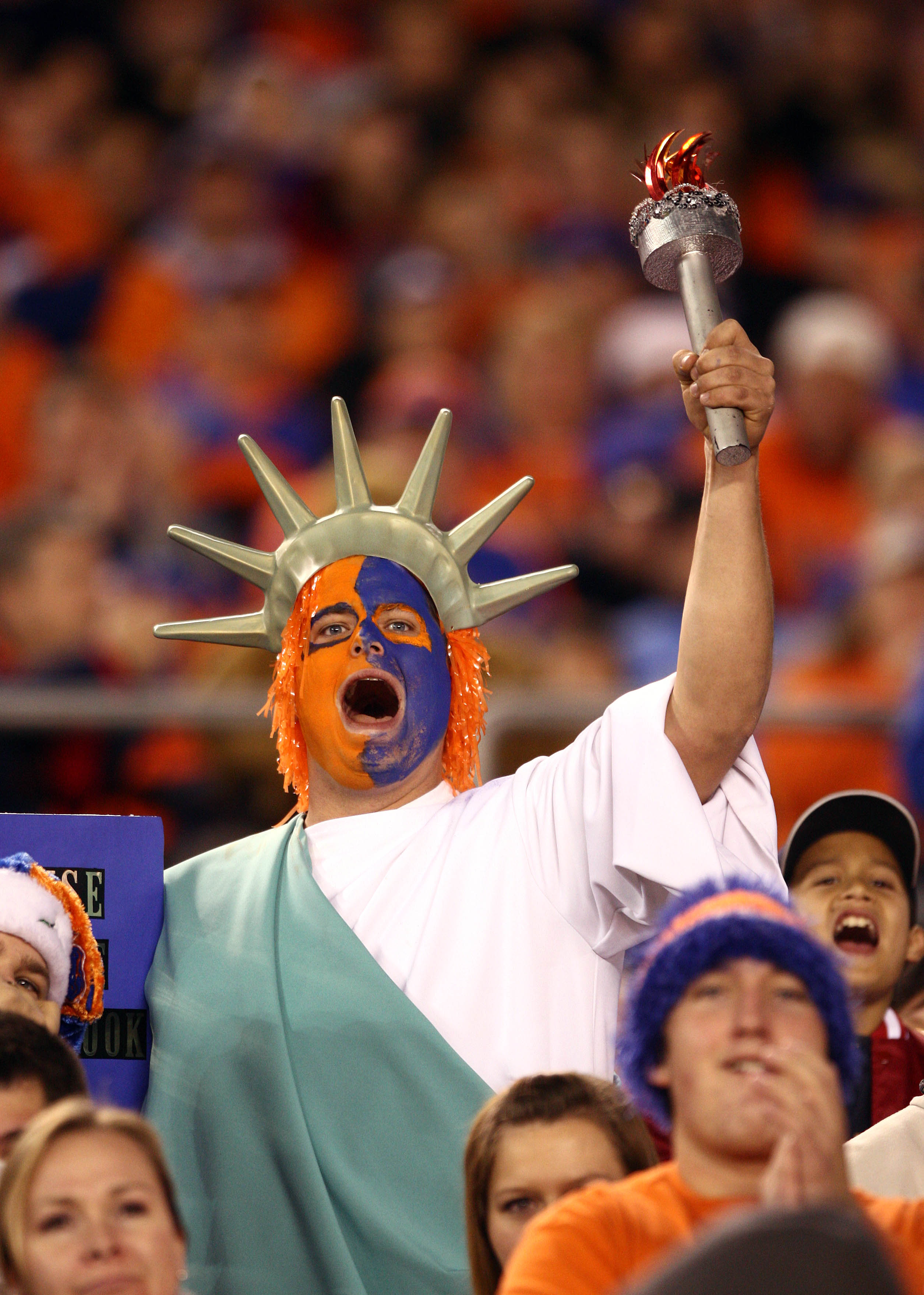 SAN DIEGO, CA - DECEMBER 23:  A fan of the Boise State Broncos dressed like the Statue of Liberty cheers from the stands against the TCU Horned Frogs during the San Diego County Credit Union Poinsettia Bowl at Qualcomm Stadium on December 23, 2008 in San