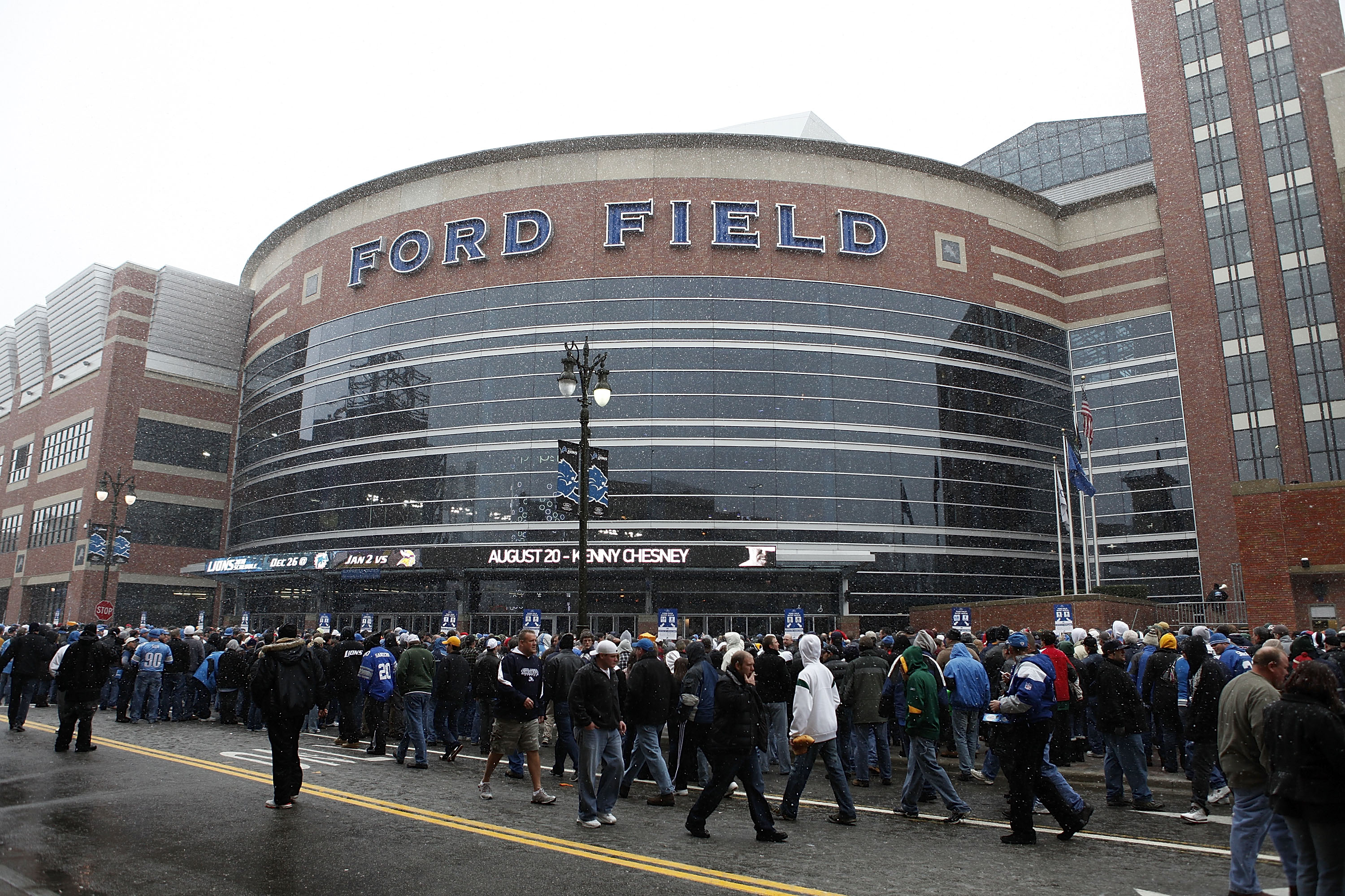 DETROIT - DECEMBER 12:  People enter Ford Field prior to the start of the game between the Green Bay Packers and the Detroit Lions at Ford Field on December 12, 2010 in Detroit, Michigan. Ford Field will host the NFL football game between the New York Gia