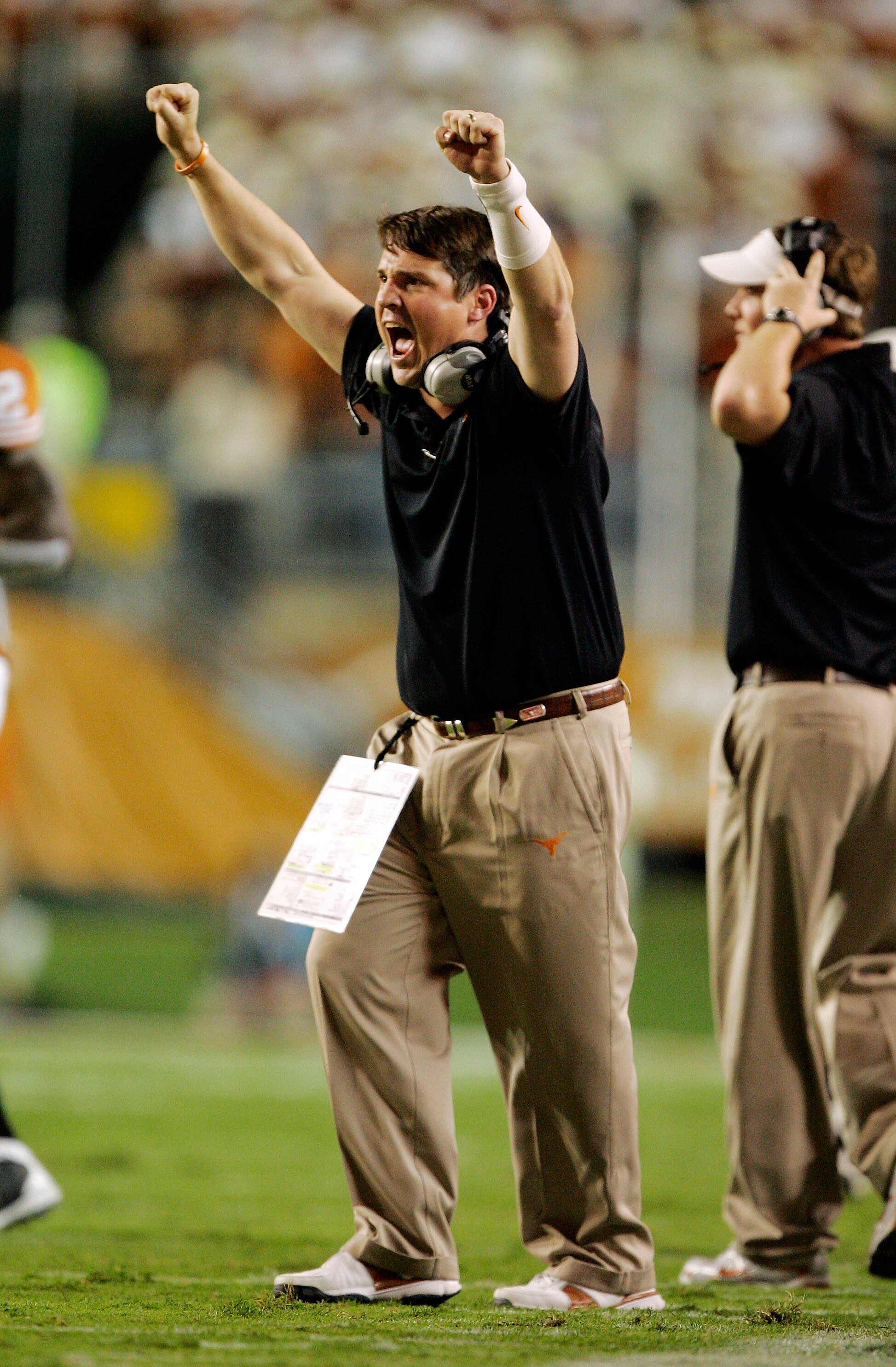 AUSTIN, TX - OCTOBER 18: Defensive coordinator Will Muschamp of the Texas Longhorns celebrates a touchdown against the Missouri Tigers in the second quarter on October 18, 2008 at Darrell K Royal-Texas Memorial Stadium in Austin, Texas. (Photo by Brian Ba