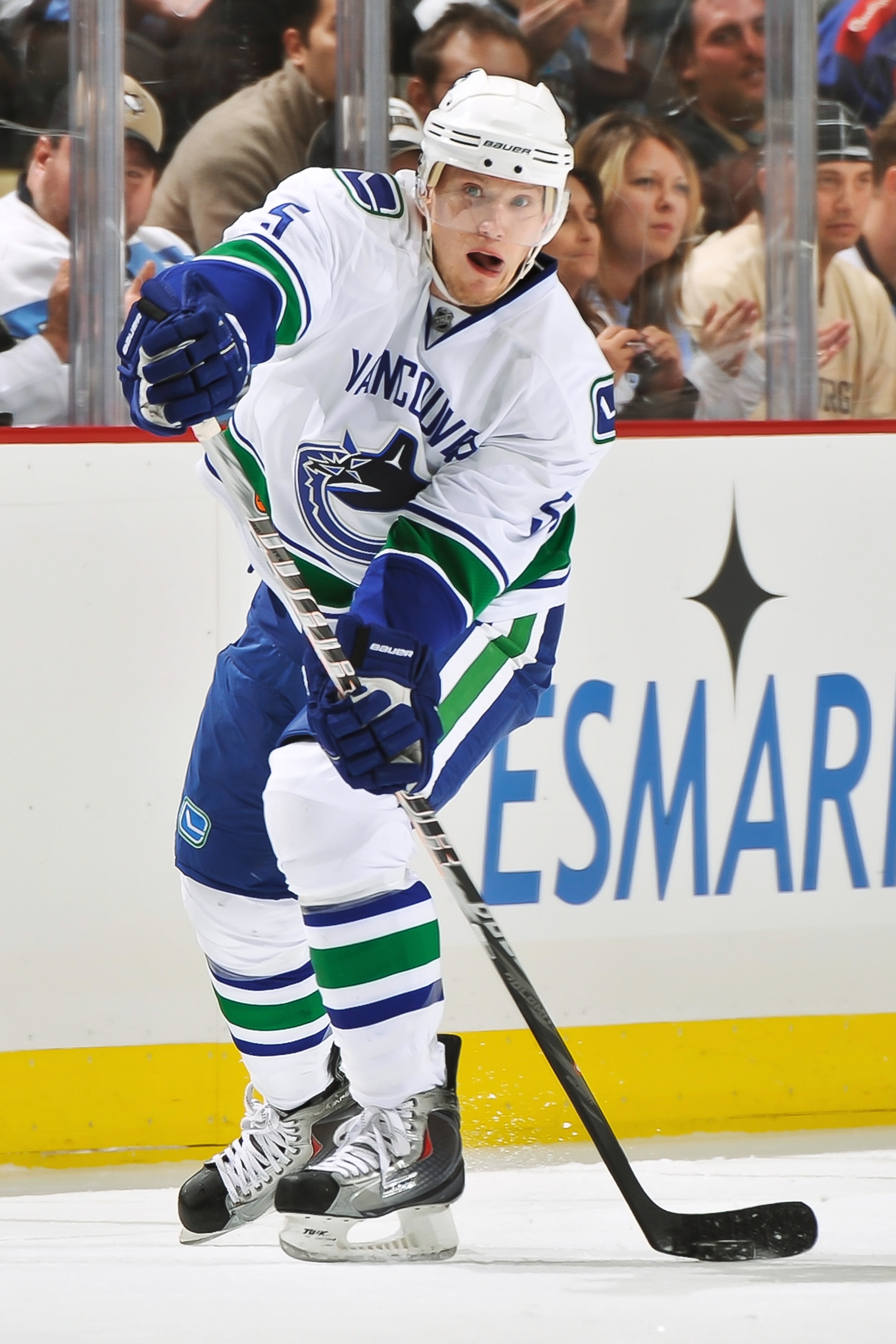PITTSBURGH - NOVEMBER 17:  Christian Ehrhoff #5 of the Vancouver Canucks skates with the puck against the Pittsburgh Penguins on November 17, 2010 at Consol Energy Center in Pittsburgh, Pennsylvania.  (Photo by Jamie Sabau/Getty Images)
