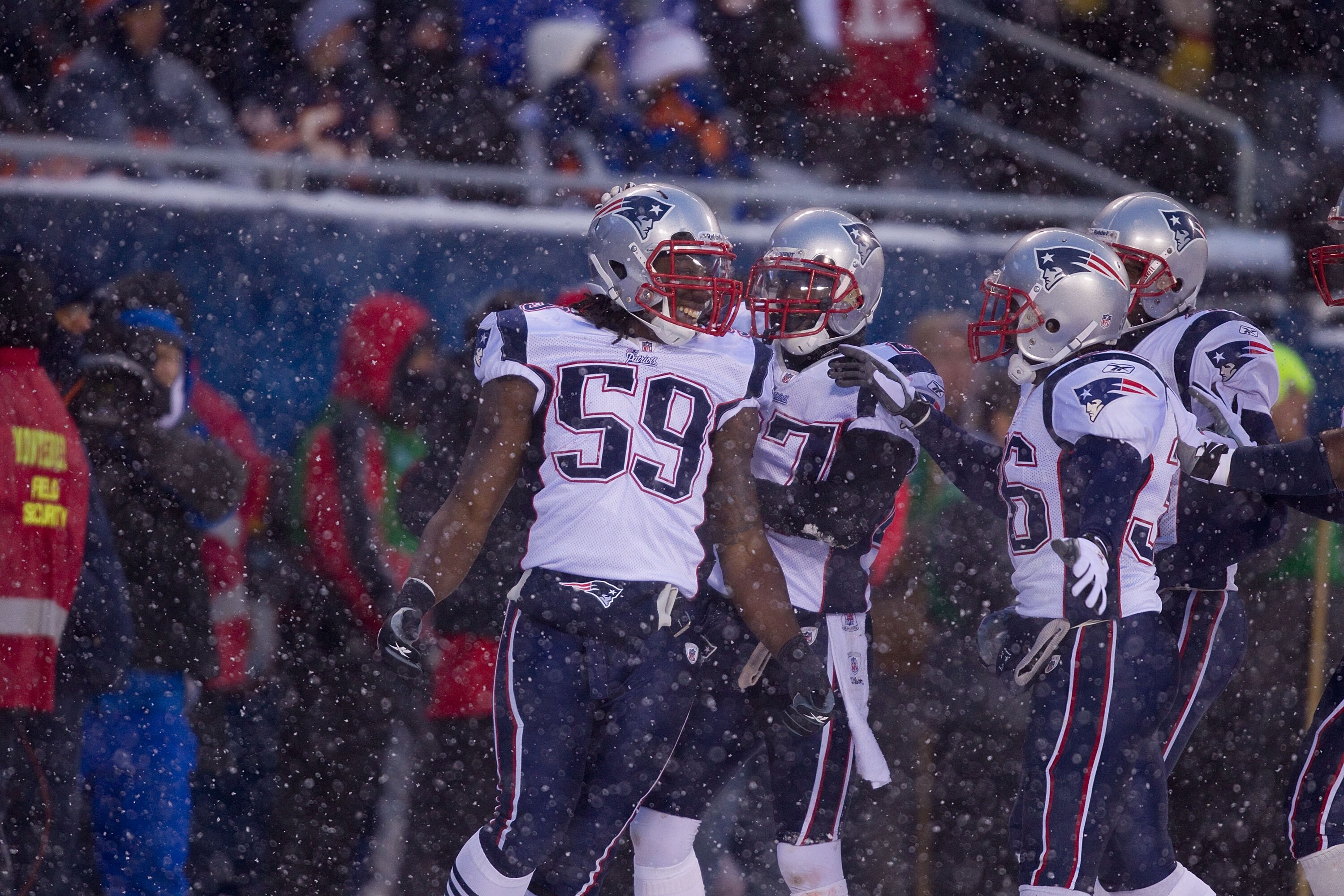 CHICAGO, IL - DECEMBER 12: Gary Guyton #59 of the New England Patriots celebrates a touchdown against the Chicago Bears at Soldier Field on December 12, 2010 in Chicago, Illinois.  The Patriots beat the Bears 36-7.  (Photo by Dilip Vishwanat/Getty Images)