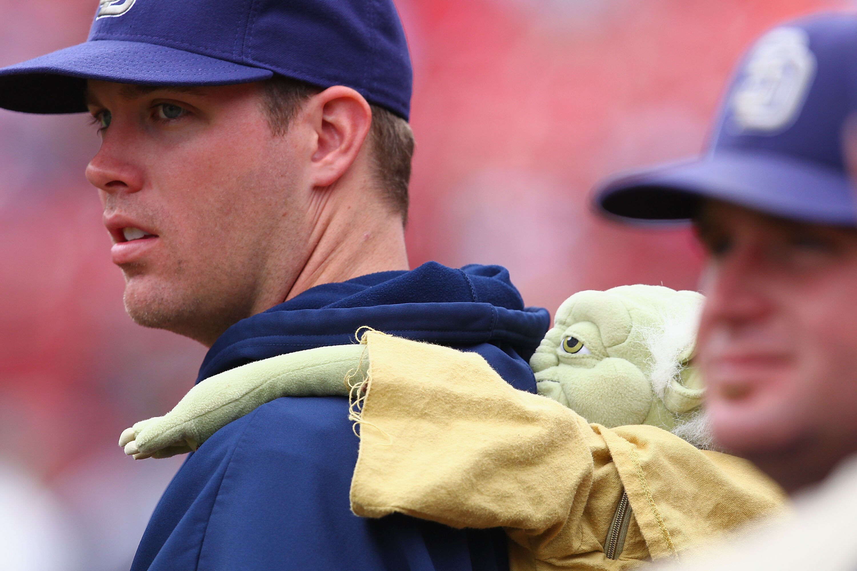 ST. LOUIS - SEPTEMBER 19: Reliever Ryan Webb #58 of the San Diego Padres wears a Yoda back pack to the bull pen prior to playing against the St. Louis Cardinals at Busch Stadium on September 19, 2010 in St. Louis, Missouri.  The Cardinals beat the Padres