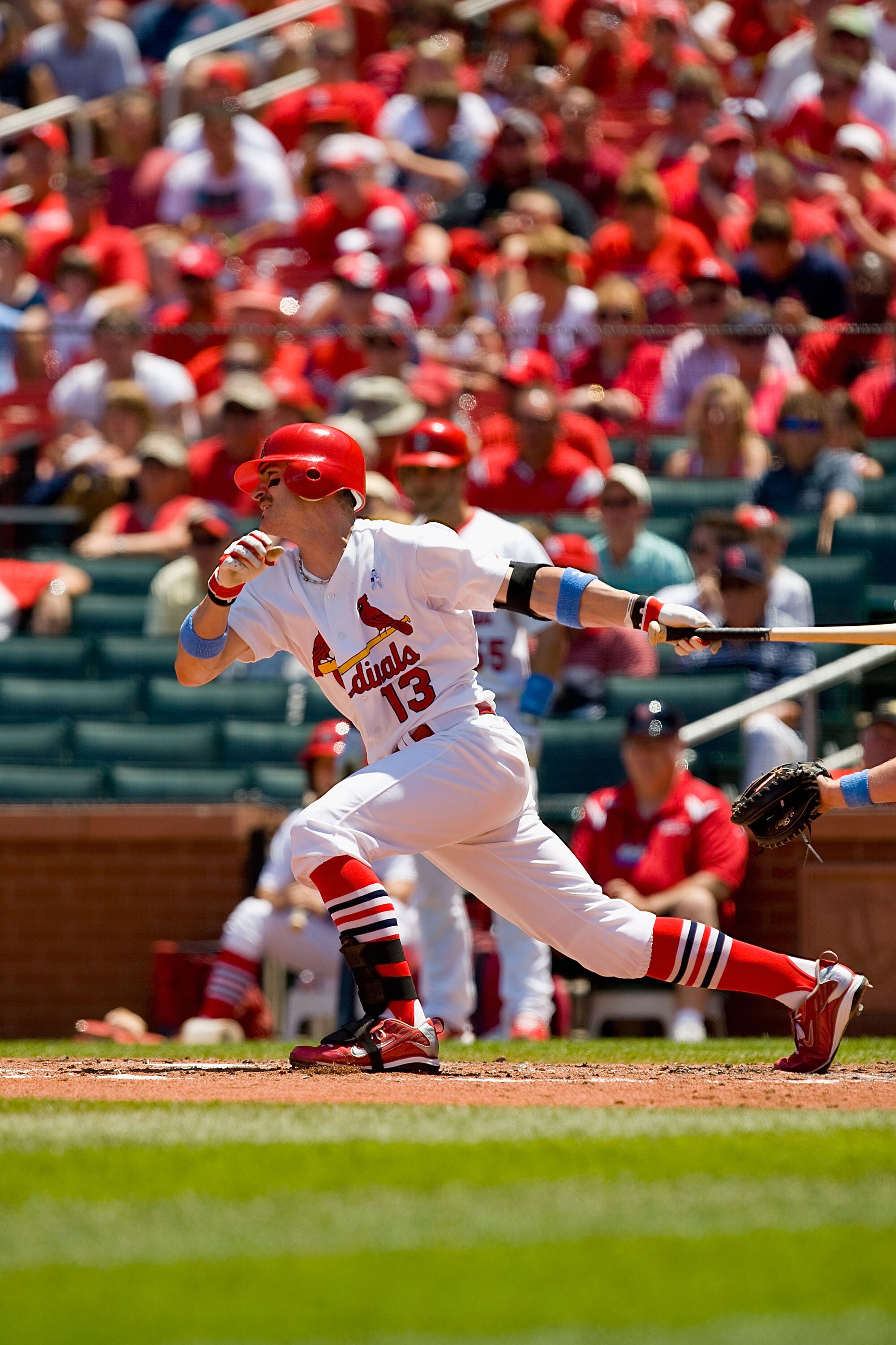 ST. LOUIS - JUNE 20: Brendan Ryan #13 of the St. Louis Cardinals bats against the Oakland Athletics at Busch Stadium on June 20, 2010 in St. Louis, Missouri.  (Photo by Dilip Vishwanat/Getty Images)