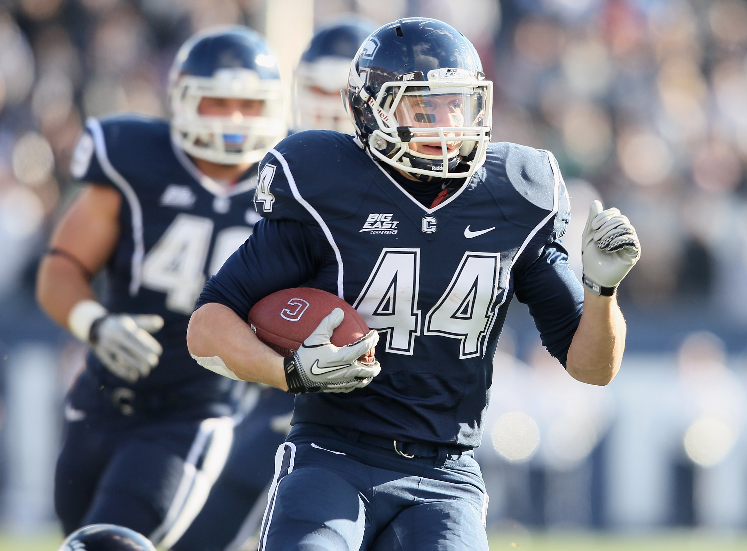 EAST HARTFORD, CT - NOVEMBER 27:  Robbie Frey #44 of the Connecticut Huskies carries the ball in the first half against the Cincinnati Bearcats on November 27, 2010 at Rentschler Field in East Hartford, Connecticut.  (Photo by Elsa/Getty Images)