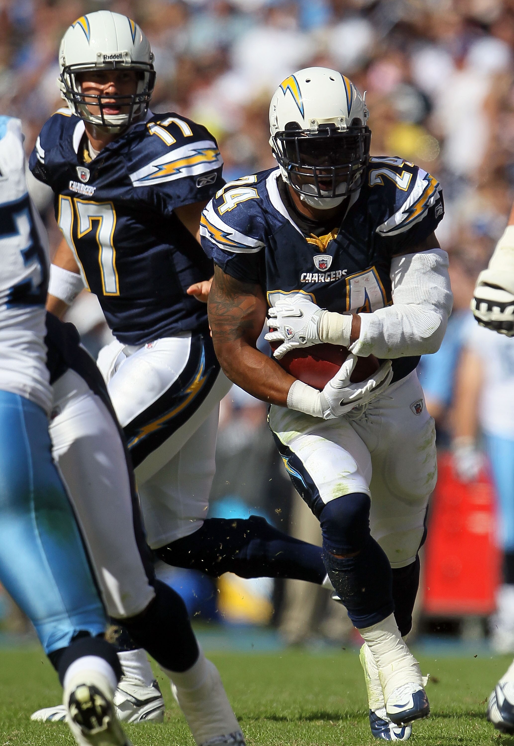 SAN DIEGO - OCTOBER 31:  Quarterback Philip Rivers #17 of the San Diego Chargers hands off to Ryan Matthews #24 in the game against the Tennessee Titans at Qualcomm Stadium on October 31, 2010 in San Diego, California. The Chargers defeated the Titans 33-