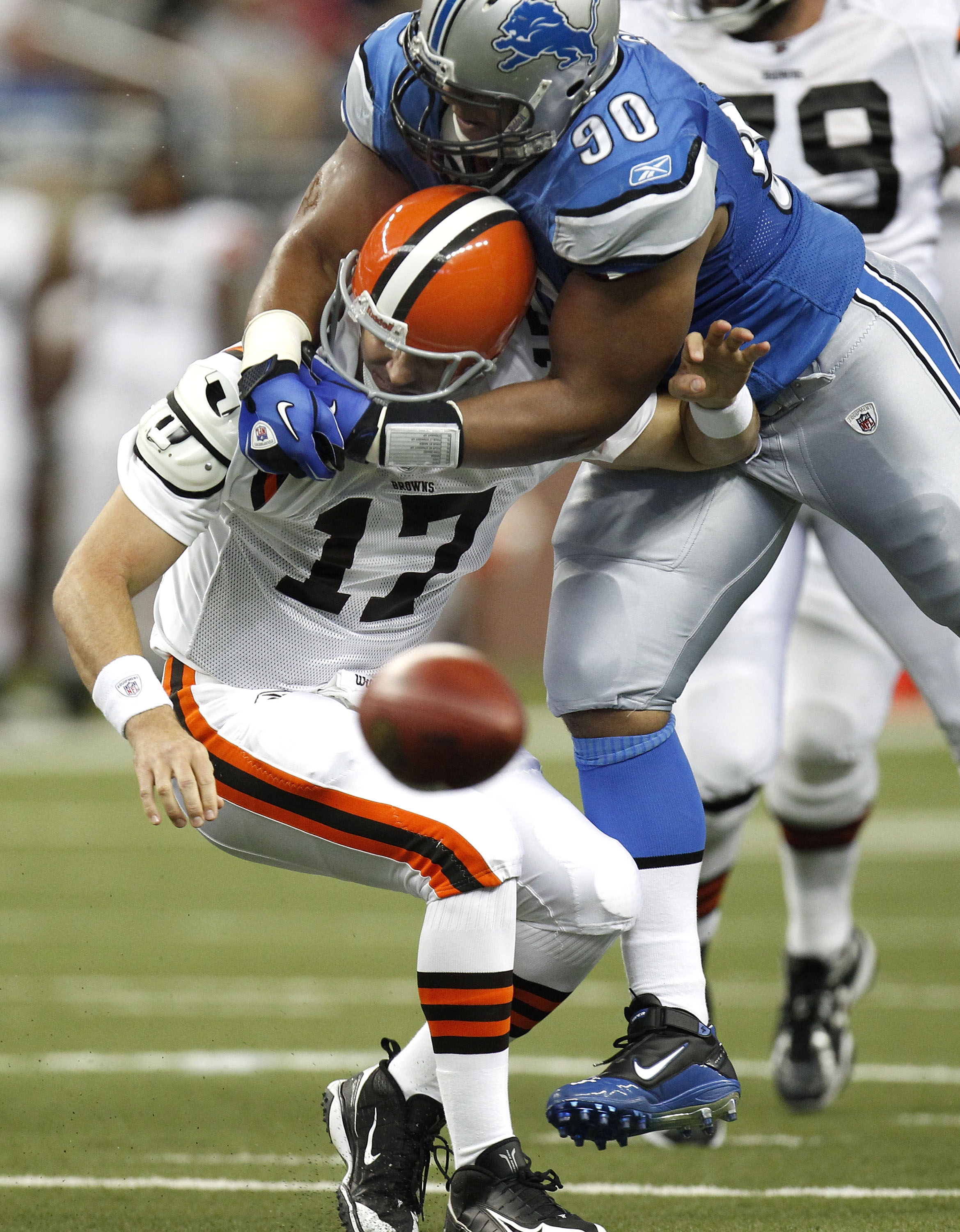 DETROIT - AUGUST 28:  Ndamukong Suh #90 of the Detroit Lions tackles Jake Delhomme #17 of the Cleveland Browns during a preseason game on August 28, 2010 at Ford Field in Detroit, Michigan. Suh was called for a personal foul on the play for grabbing the f
