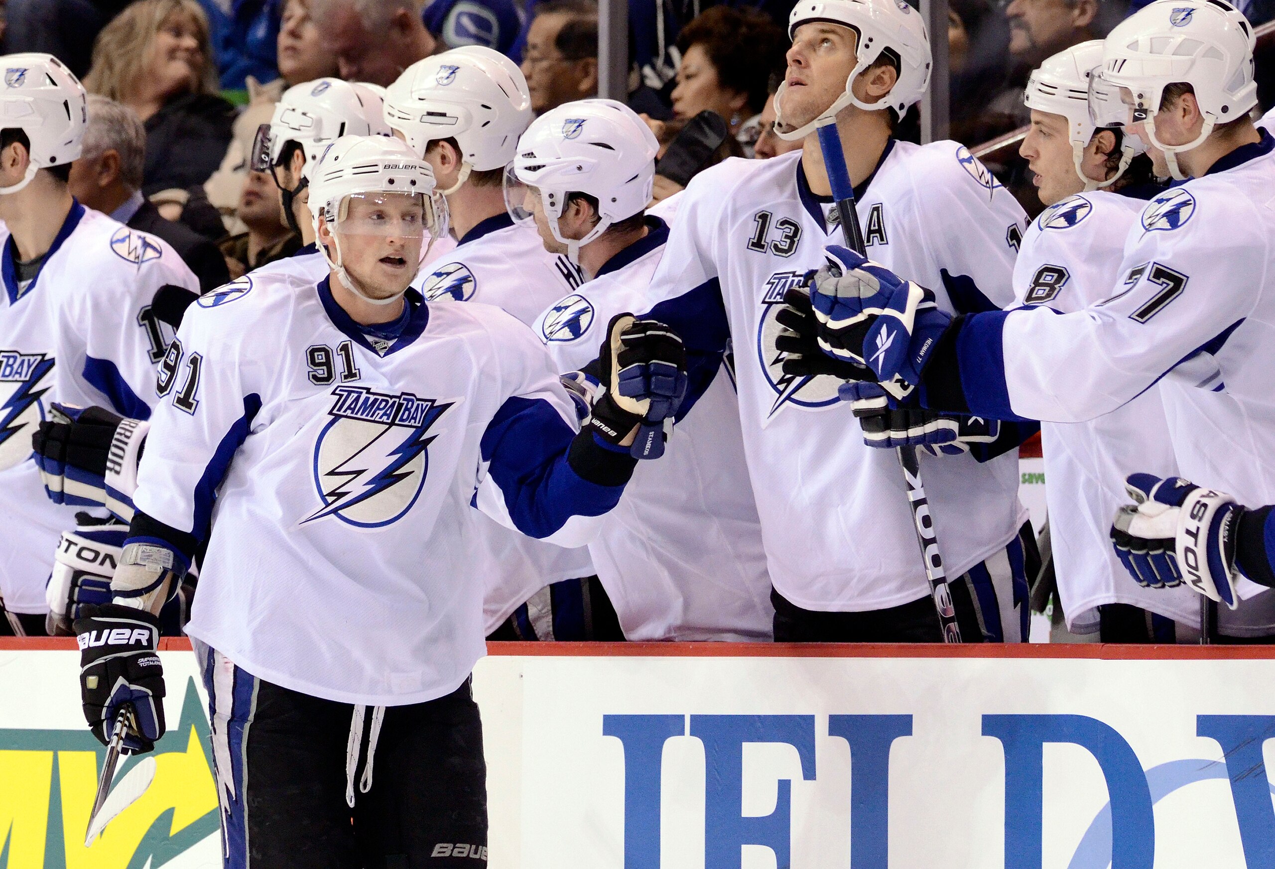 VANCOUVER, CANADA - DECEMBER 11:  Steven Stamkos #91 of the Tampa Bay Lightning is congratulated by teammates after scoring against the Vancouver Canucks during the second period in NHL action on December 11, 2010 at Rogers Arena in Vancouver, BC, Canada.