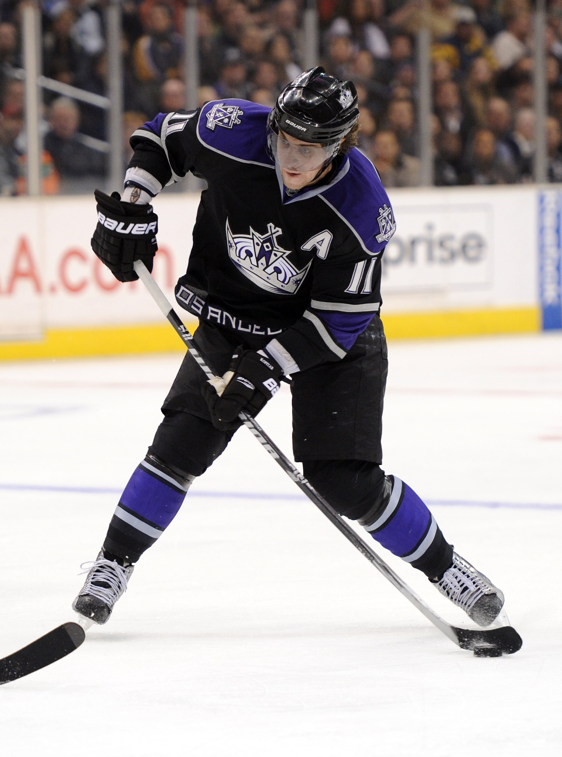 LOS ANGELES, CA - DECEMBER 02:  Anze Kopitar #11 of the Los Angeles Kings shoots the puck in the slot against the Florida Panthers during the game at the Staples Center on December 2, 2010 in Los Angeles, California.  (Photo by Harry How/Getty Images)