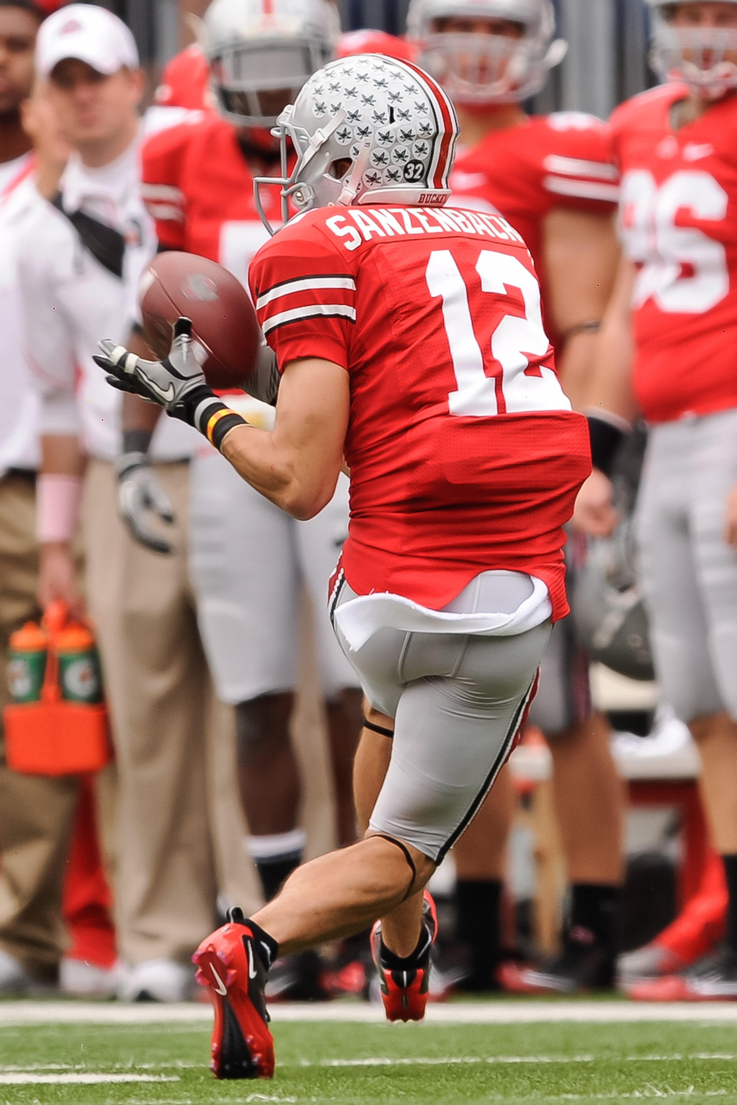 COLUMBUS, OH - OCTOBER 23:  Dane Sanzenbacher #12 of the Ohio State Buckeyes makes a reception against the Purdue Boilermakers at Ohio Stadium on October 23, 2010 in Columbus, Ohio.  (Photo by Jamie Sabau/Getty Images)
