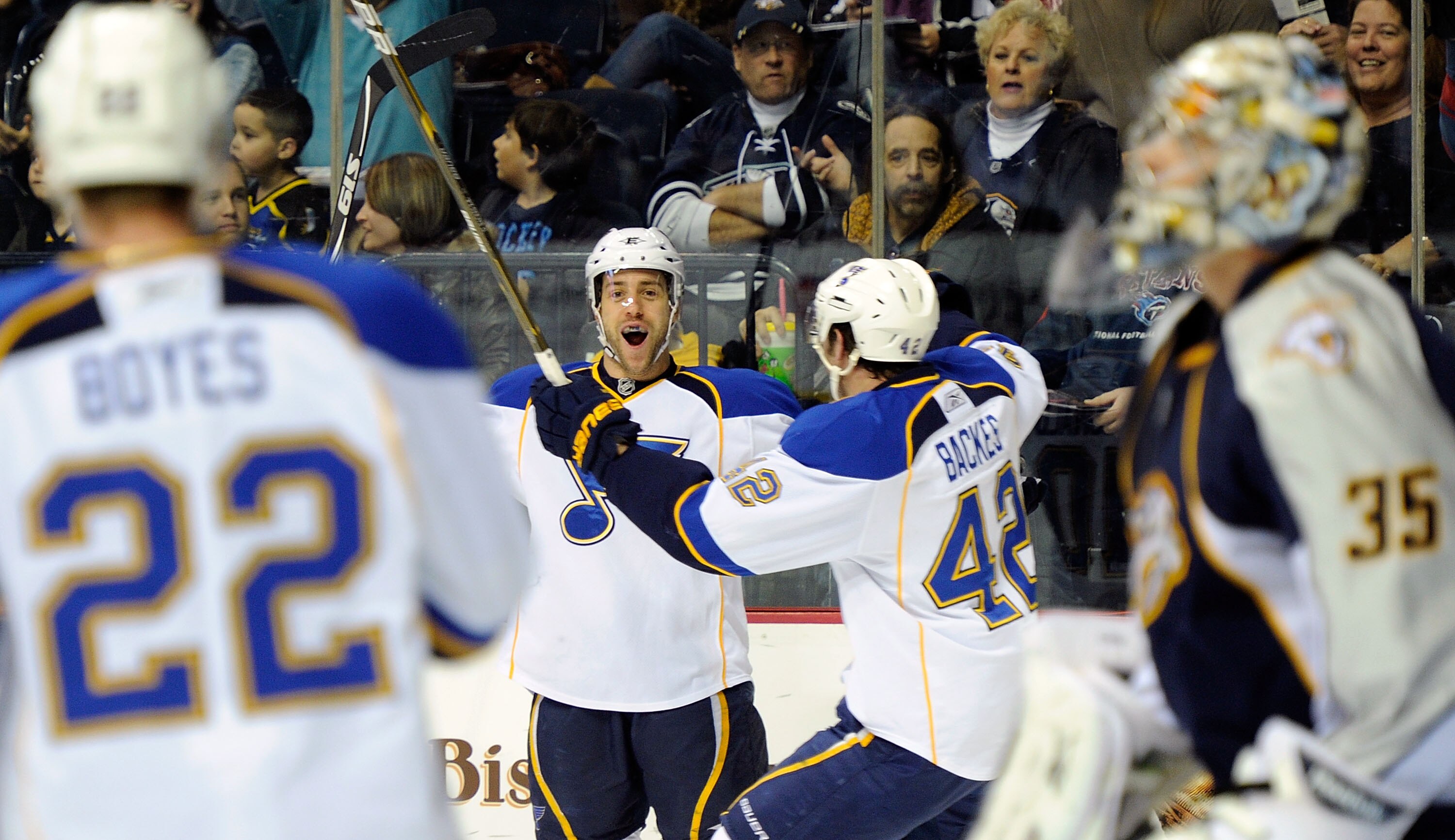 NASHVILLE, TN - NOVEMBER 24:  Brad Boyes #22, Andy McDonald #10, and David Backes #42 of the St. Louis Blues celebrate a goal against the Nashville Predators on November 24, 2010 at the Bridgestone Arena in Nashville, Tennessee.  (Photo by Frederick Breed