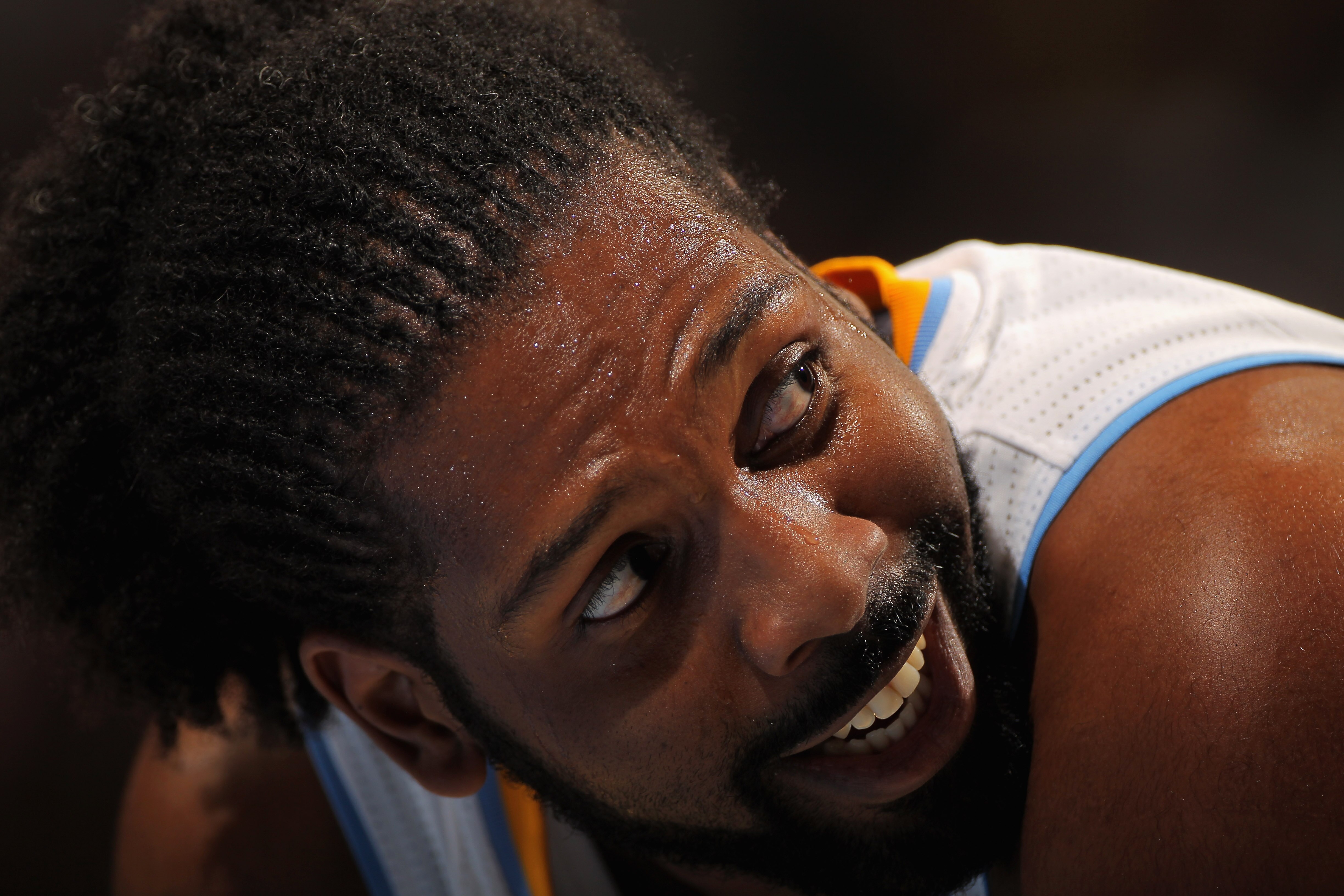 DENVER - NOVEMBER 16:  Nene #31 of the Denver Nuggets looks on during a break in the action against the New York Knicks at the Pepsi Center on November 16, 2010 in Denver, Colorado. The Nuggets defeated the Knicks 120-118. NOTE TO USER: User expressly ack