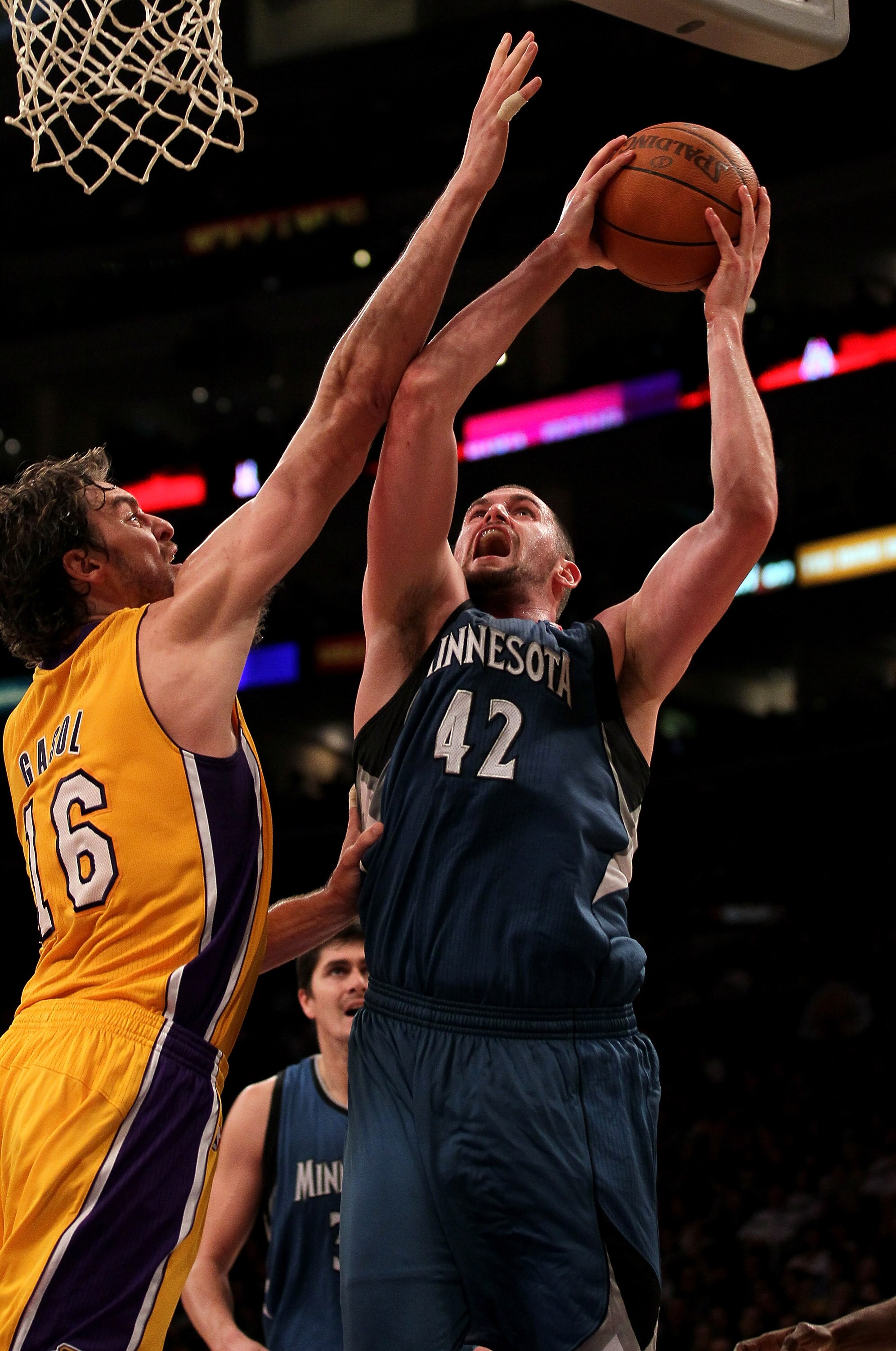 LOS ANGELES - NOVEMBER 9: Kevin Love #42 of the Minnesota Timberwolves shoots over Pau Gasol #16 of the Los Angeles Lakers at Staples Center on November 9, 2010 in Los Angeles, California. The Lakers won 99-94.   NOTE TO USER: User expressly acknowledges