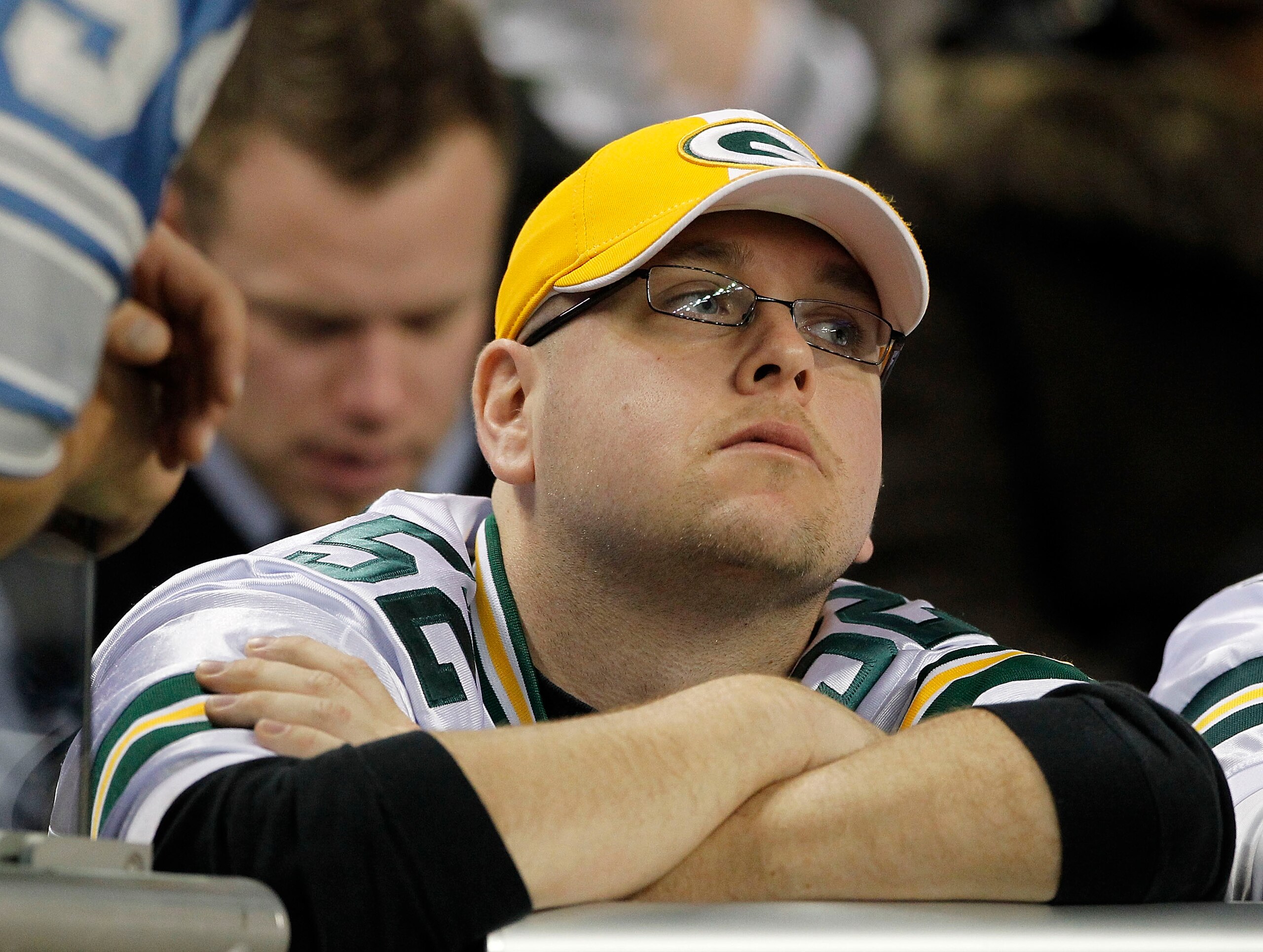 DETROIT - DECEMBER 12:  Green Bay Packers fan reacts after the Detroit Lions defeated the Green Bay Packers 7-3 at Ford Field on December 12, 2010 in Detroit, Michigan.  (Photo by Leon Halip/Getty Images)