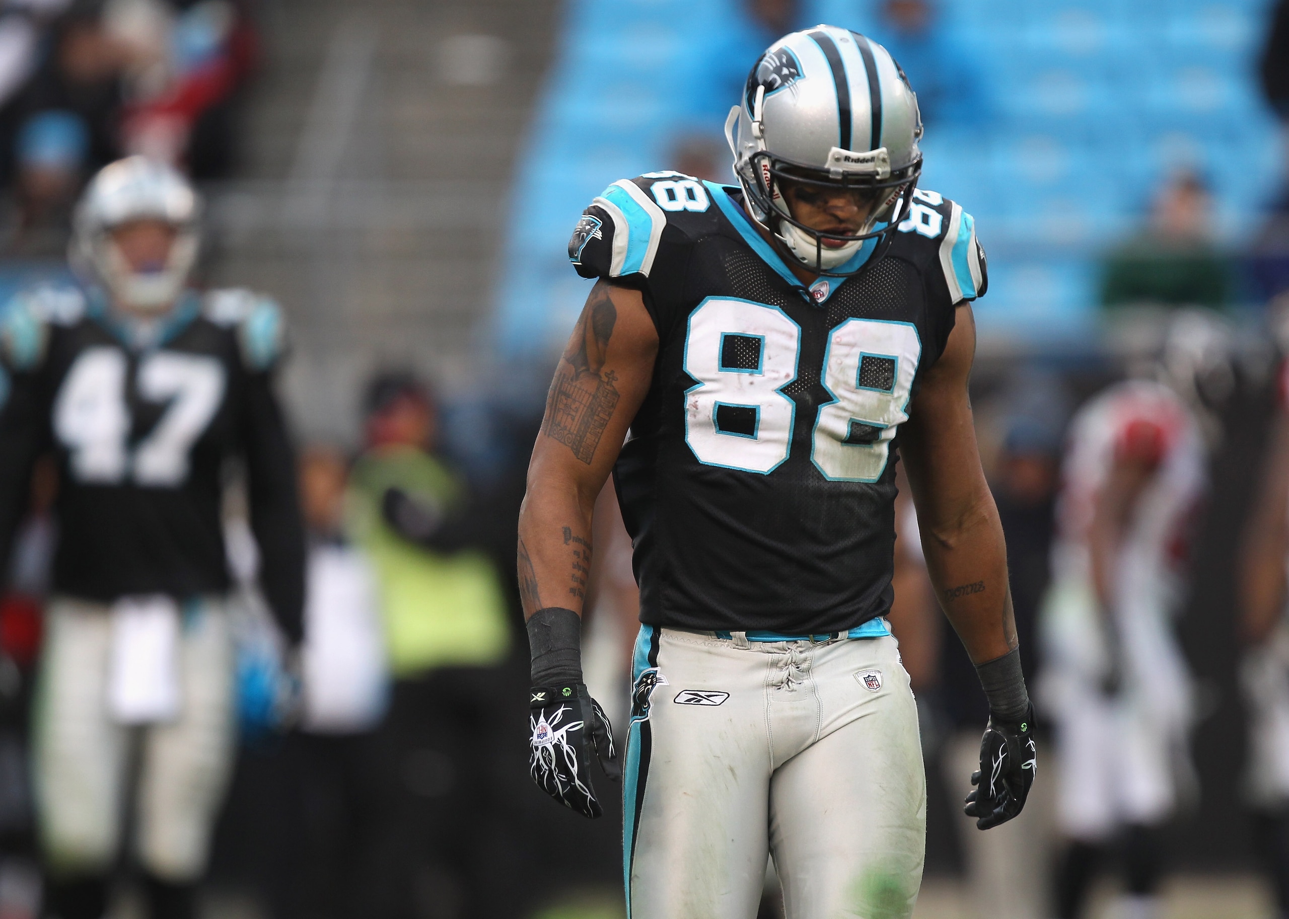 CHARLOTTE, NC - DECEMBER 12:  Donte Rosario #88 of the Carolina Panthers walks off the field against the Atlanta Falcons during their game at Bank of America Stadium on December 12, 2010 in Charlotte, North Carolina.  (Photo by Streeter Lecka/Getty Images