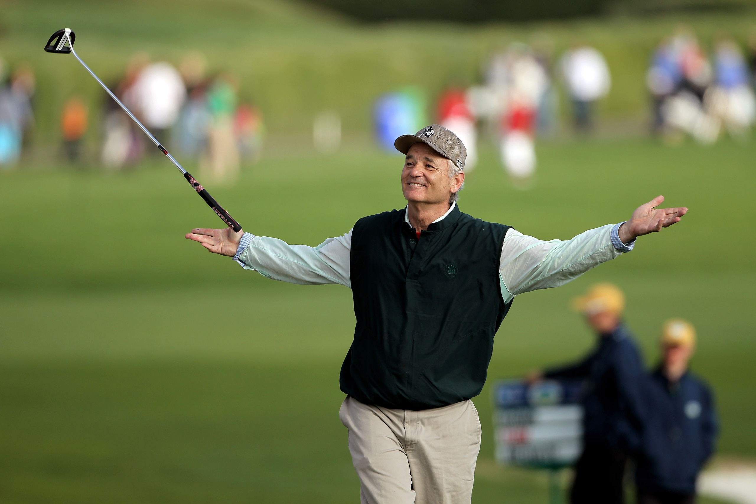 PEBBLE BEACH, CA - FEBRUARY 13:  Actor Bill Murray tosses his club in the air after sinking a putt on the 18th hole during round three of the AT&T Pebble Beach National Pro-Am at Pebble Beach Golf Links on February 13, 2010 in Pebble Beach, California.  (