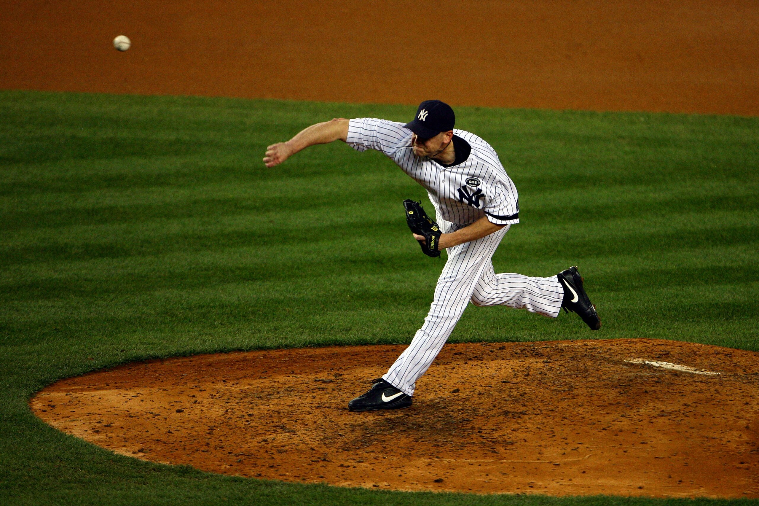 NEW YORK - OCTOBER 20:  Kerry Wood #39 of the New York Yankees pitches against the Texas Rangers in Game Five of the ALCS during the 2010 MLB Playoffs at Yankee Stadium on October 20, 2010 in the Bronx borough of New York City.  (Photo by Andrew Burton/Ge