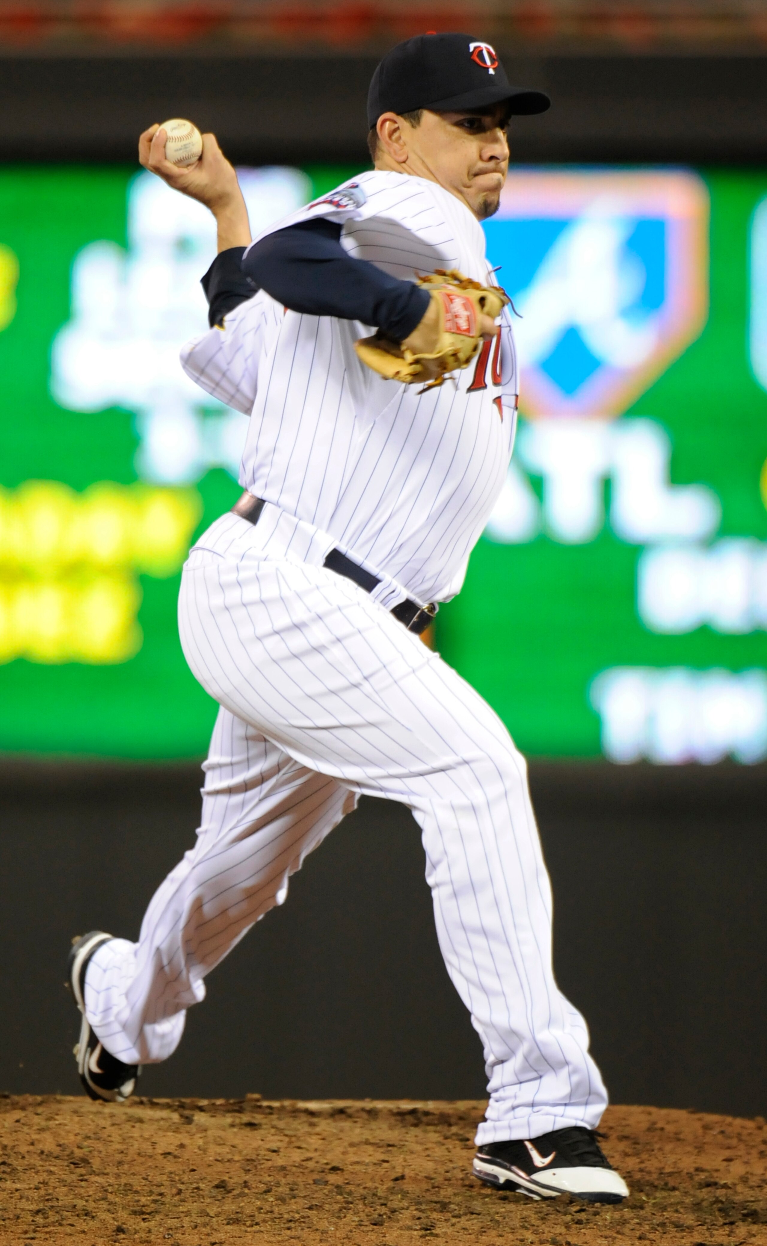 MINNEAPOLIS, MN - OCTOBER 6: Brian Fuentes #51 of the Minnesota Twins pitches during game one of the ALDS agaisnt the New York Yankees on October 6, 2010 at Target Field in Minneapolis, Minnesota. (Photo by Hannah Foslien/Getty Images)