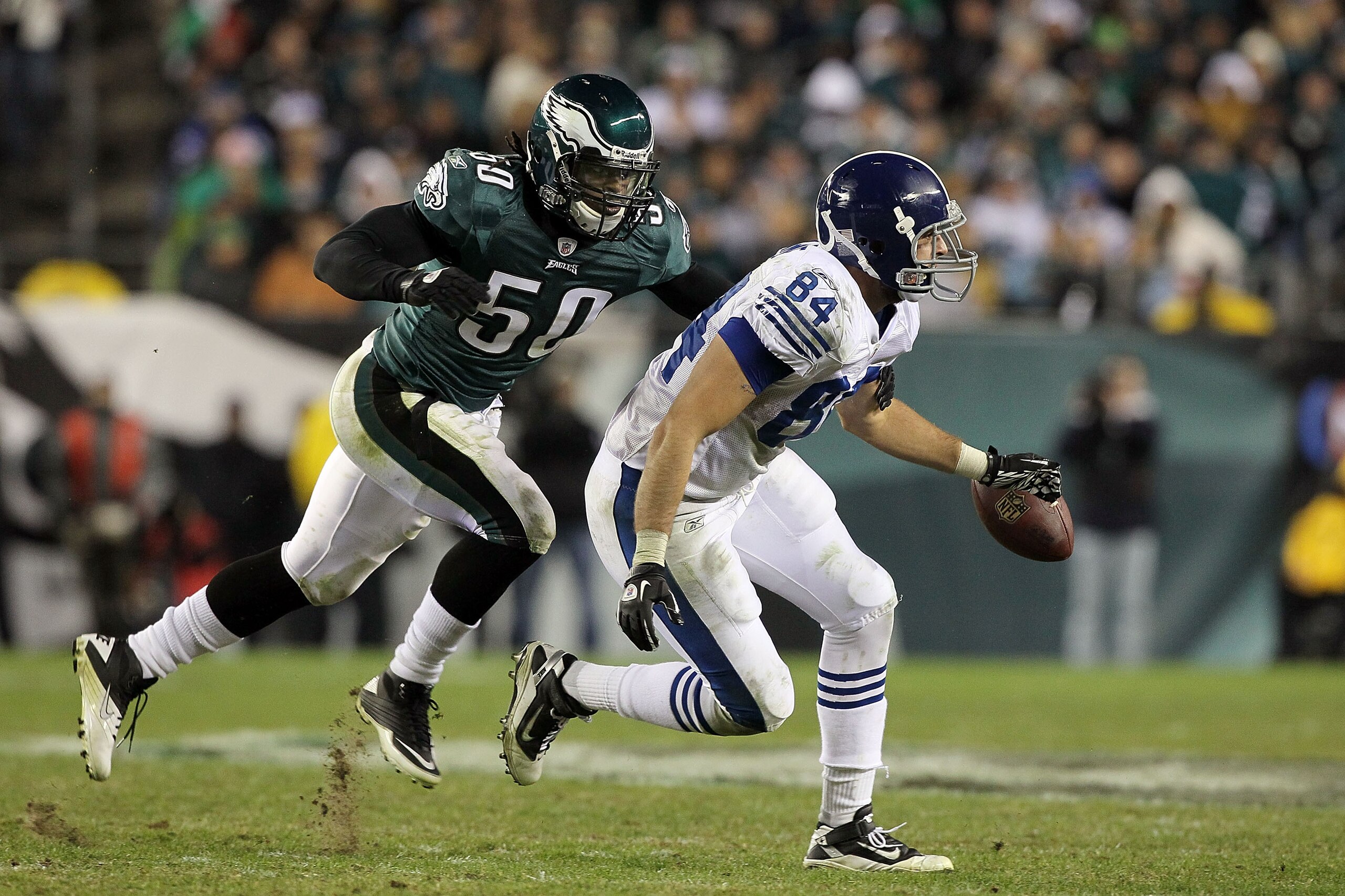 PHILADELPHIA - NOVEMBER 07:  Jacob Tamme #84 of the Indianapolis Colts can not come up with a pass as he is defended by Ernie Sims #50 of the Philadelphia Eagles on November 7, 2010 at Lincoln Financial Field in Philadelphia, Pennsylvania. The Eagles defe
