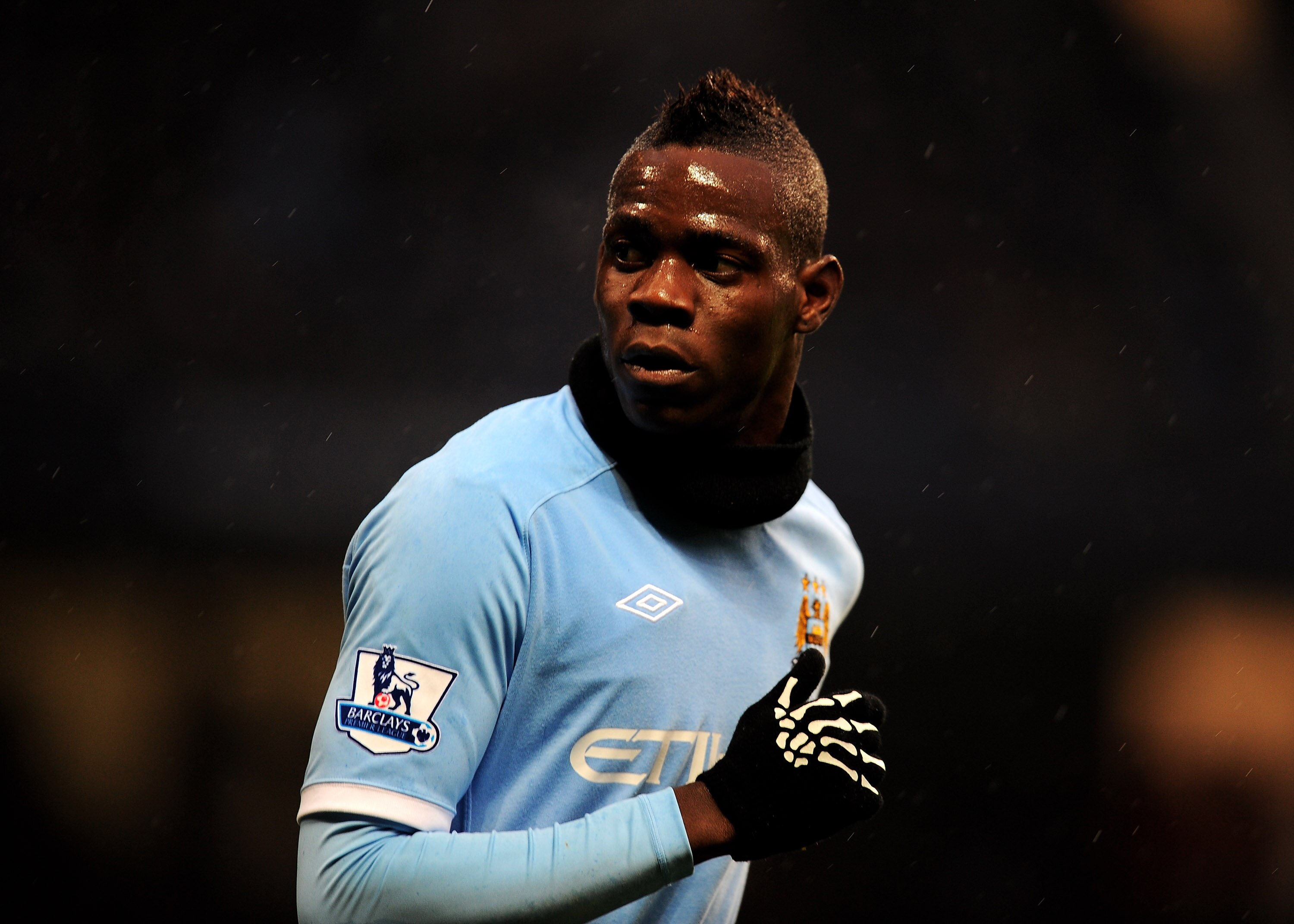 MANCHESTER, UNITED KINGDOM - DECEMBER 04:   Mario Balotelli of Manchester City looks on during the Barclays Premier League match between Manchester City and Bolton Wanderers at the City of Manchester Stadium on December 4, 2010 in Manchester, England. (Ph
