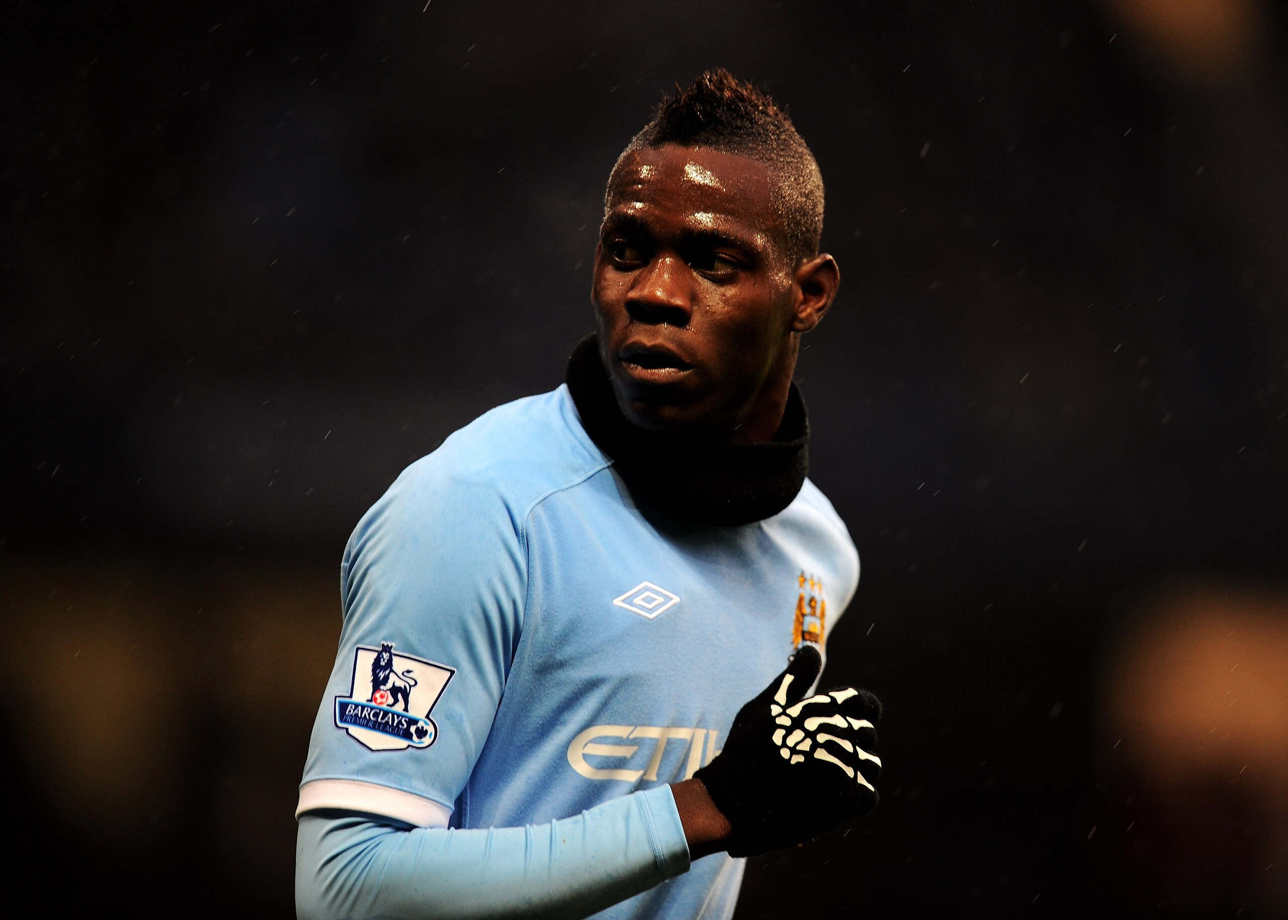 MANCHESTER, UNITED KINGDOM - DECEMBER 04:   Mario Balotelli of Manchester City looks on during the Barclays Premier League match between Manchester City and Bolton Wanderers at the City of Manchester Stadium on December 4, 2010 in Manchester, England. (Ph