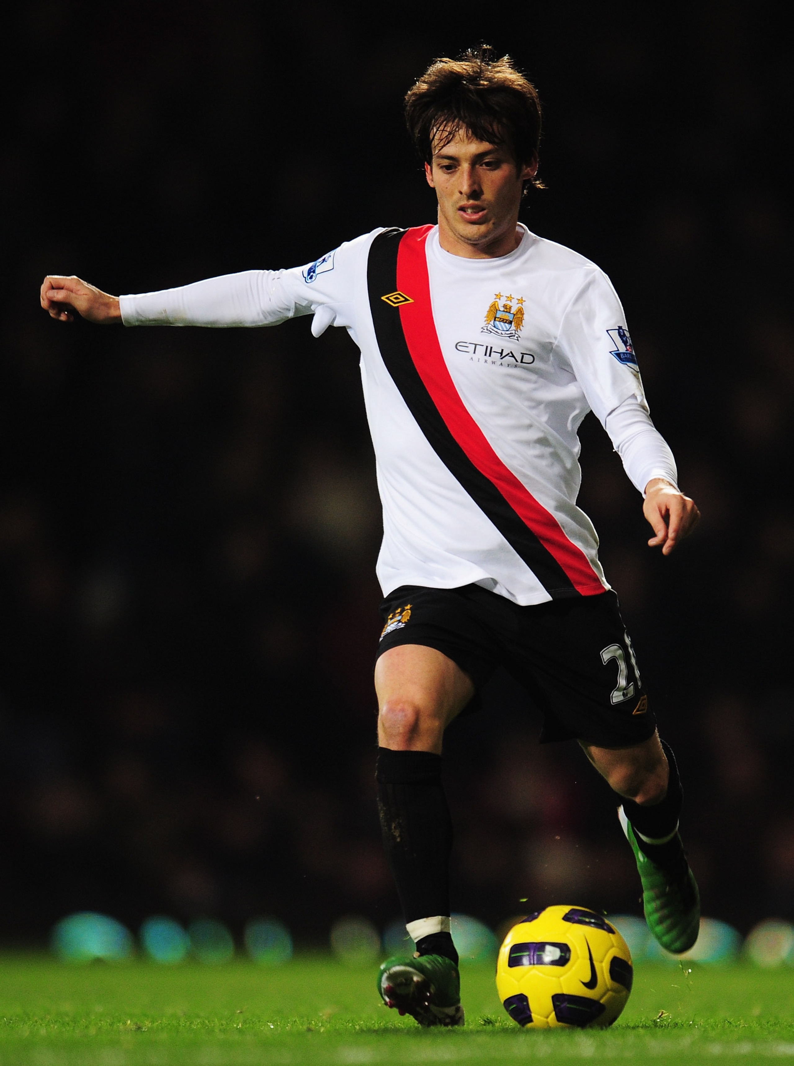 LONDON, UNITED KINGDOM - DECEMBER 11:  David Silva of Manchester City runs with the ball during the Barclays Premier League match between West Ham United and Manchester City at Upton Park on December 11, 2010 in London, England.  (Photo by Shaun Botterill