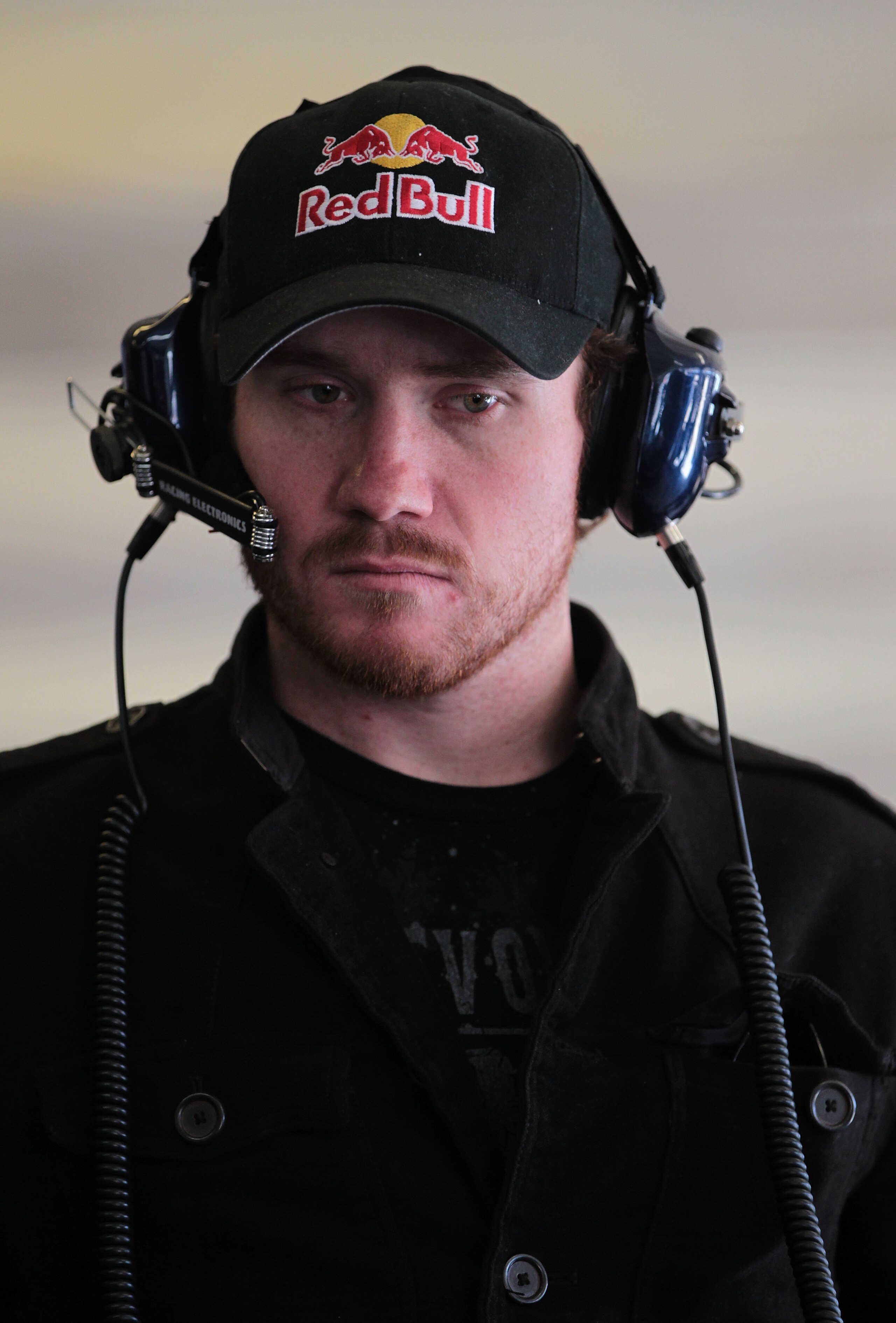 FORT WORTH, TX - NOVEMBER 05:  Driver Brian Vickers stands in the garage during practice for the NASCAR Sprint Cup Series AAA Texas 500 at Texas Motor Speedway on November 5, 2010 in Fort Worth, Texas.  (Photo by Jamie Squire/Getty Images)