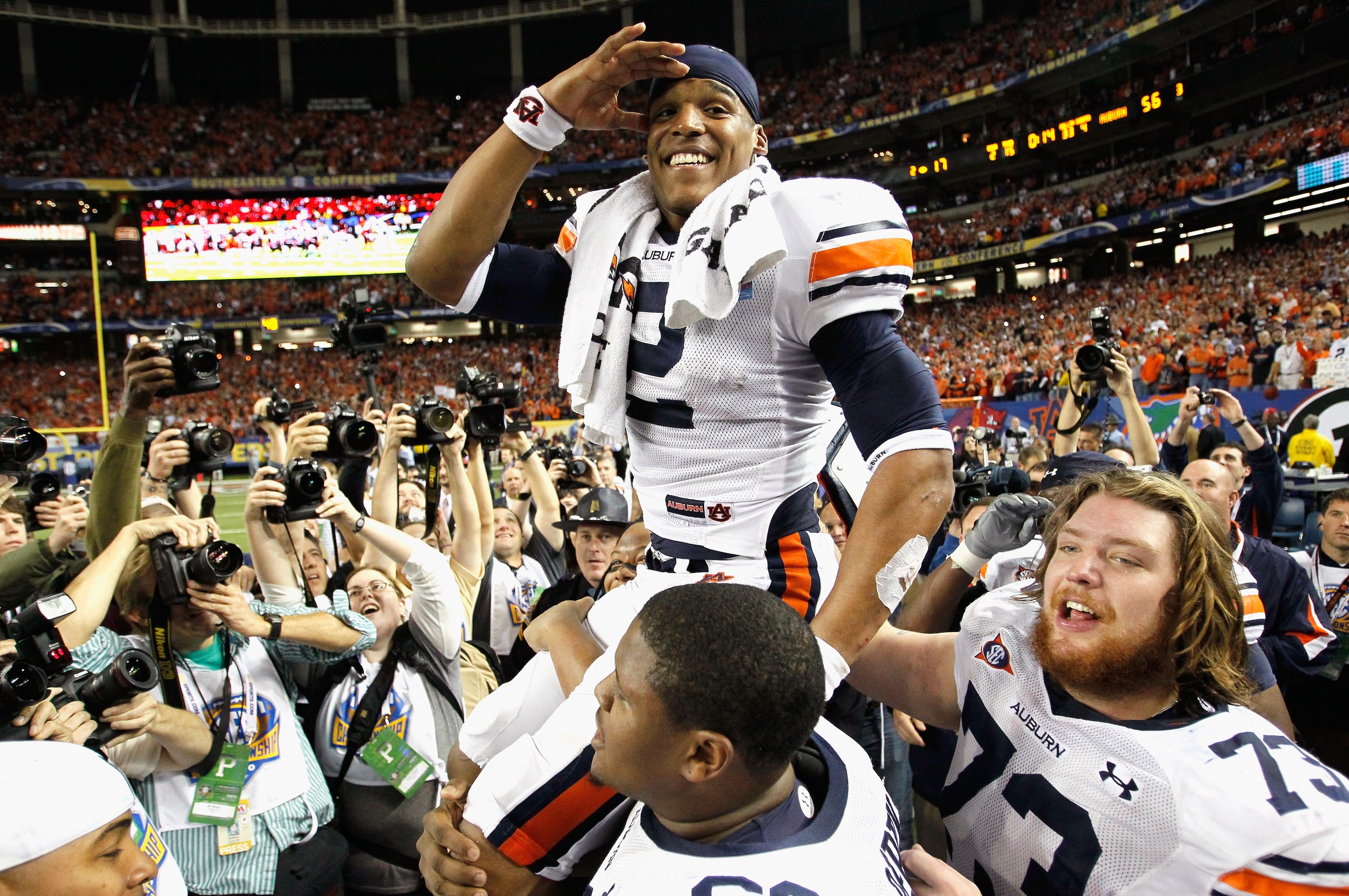 ATLANTA, GA - DECEMBER 04:  Quarterback Cam Newton #2 of the Auburn Tigers celebrates after their 56-17 win over the South Carolina Gamecocks during the 2010 SEC Championship at Georgia Dome on December 4, 2010 in Atlanta, Georgia.  (Photo by Kevin C. Cox