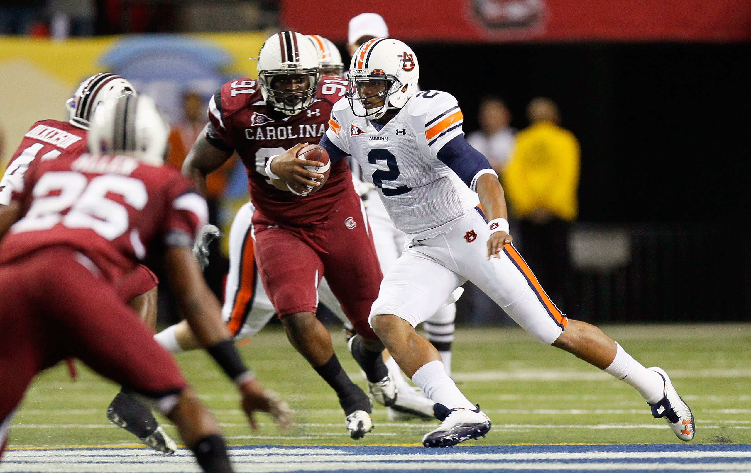 ATLANTA, GA - DECEMBER 04:  Quarterback Cam Newton #2 of the Auburn Tigers rushes upfield against the South Carolina Gamecocks during the 2010 SEC Championship at Georgia Dome on December 4, 2010 in Atlanta, Georgia.  (Photo by Kevin C. Cox/Getty Images)