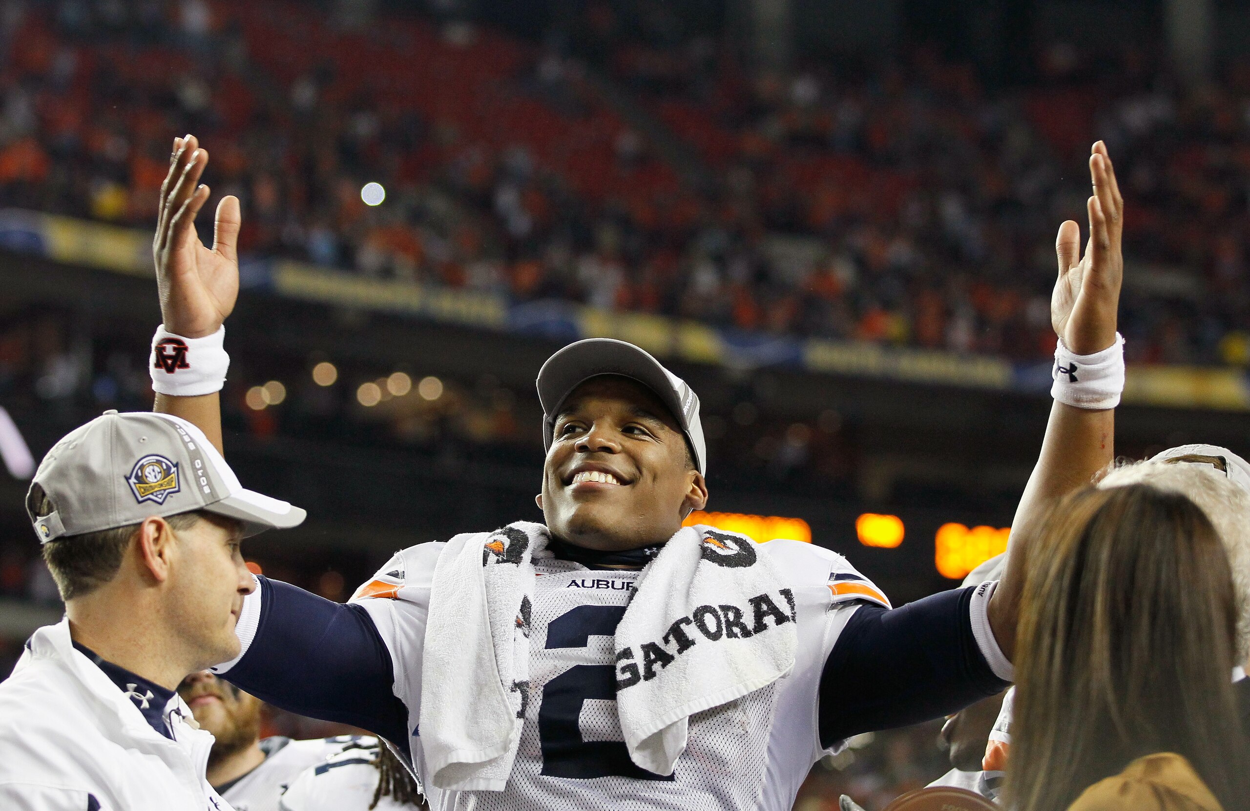 ATLANTA, GA - DECEMBER 04:  Quarterback Cam Newton #2 of the Auburn Tigers celebrates after their 56-17 win over the South Carolina Gamecocks during the 2010 SEC Championship at Georgia Dome on December 4, 2010 in Atlanta, Georgia.  (Photo by Kevin C. Cox