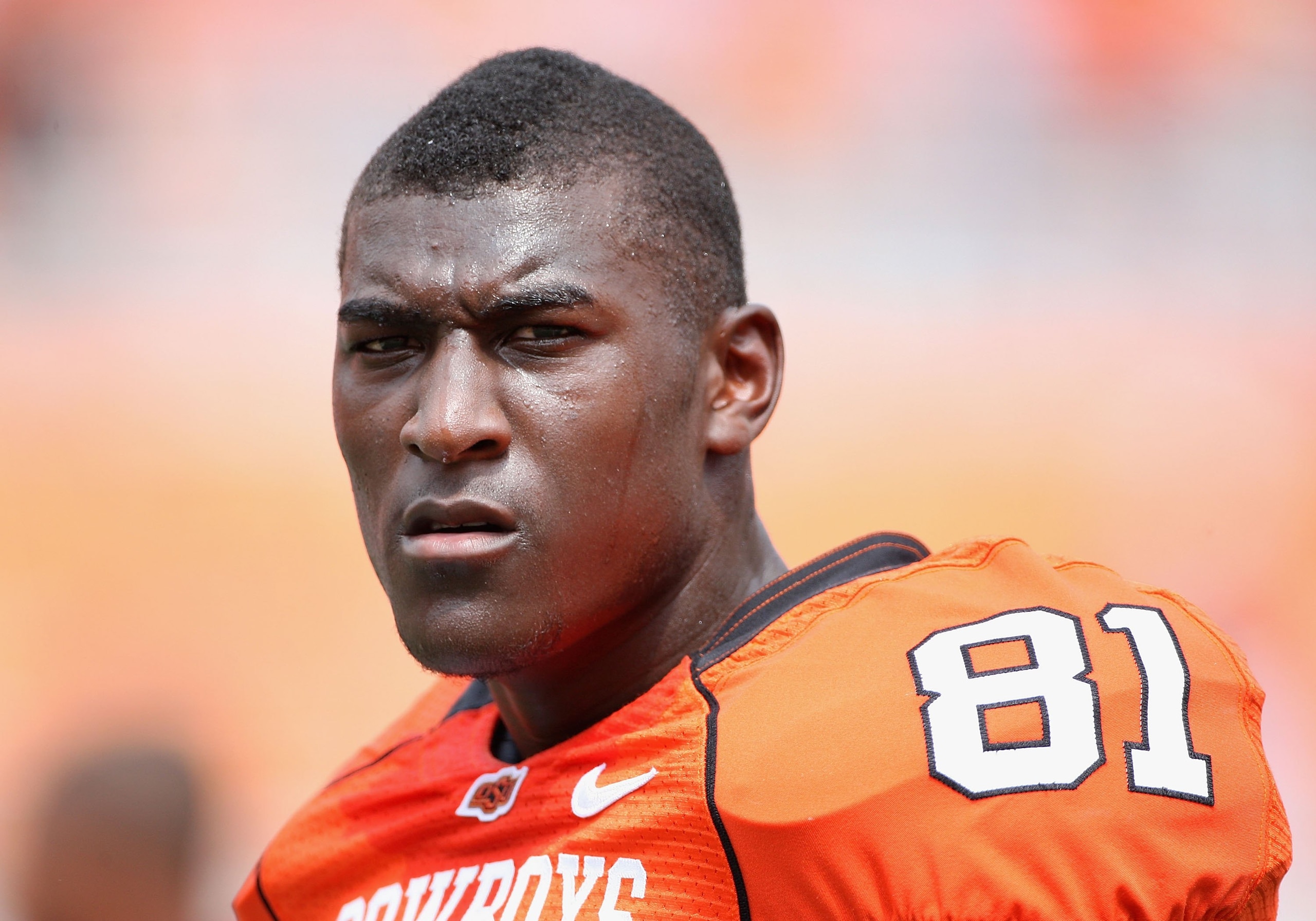 STILLWATER, OK - SEPTEMBER 05: Wide receiver Justin Blackmon #81 of the Oklahoma State Cowboys warms up before the college football game against the Georgia Bulldogs at Boone Pickens Stadium on September 5, 2009 in Stillwater, Oklahoma. The Cowboys defe STILLWATER, OK - SEPTEMBER 05: Wide receiver Justin Blackmon #81 of the Oklahoma State Cowboys warms up before the college football game against the Georgia Bulldogs at Boone Pickens Stadium on September 5, 2009 in Stillwater, Oklahoma. The Cowboys defe