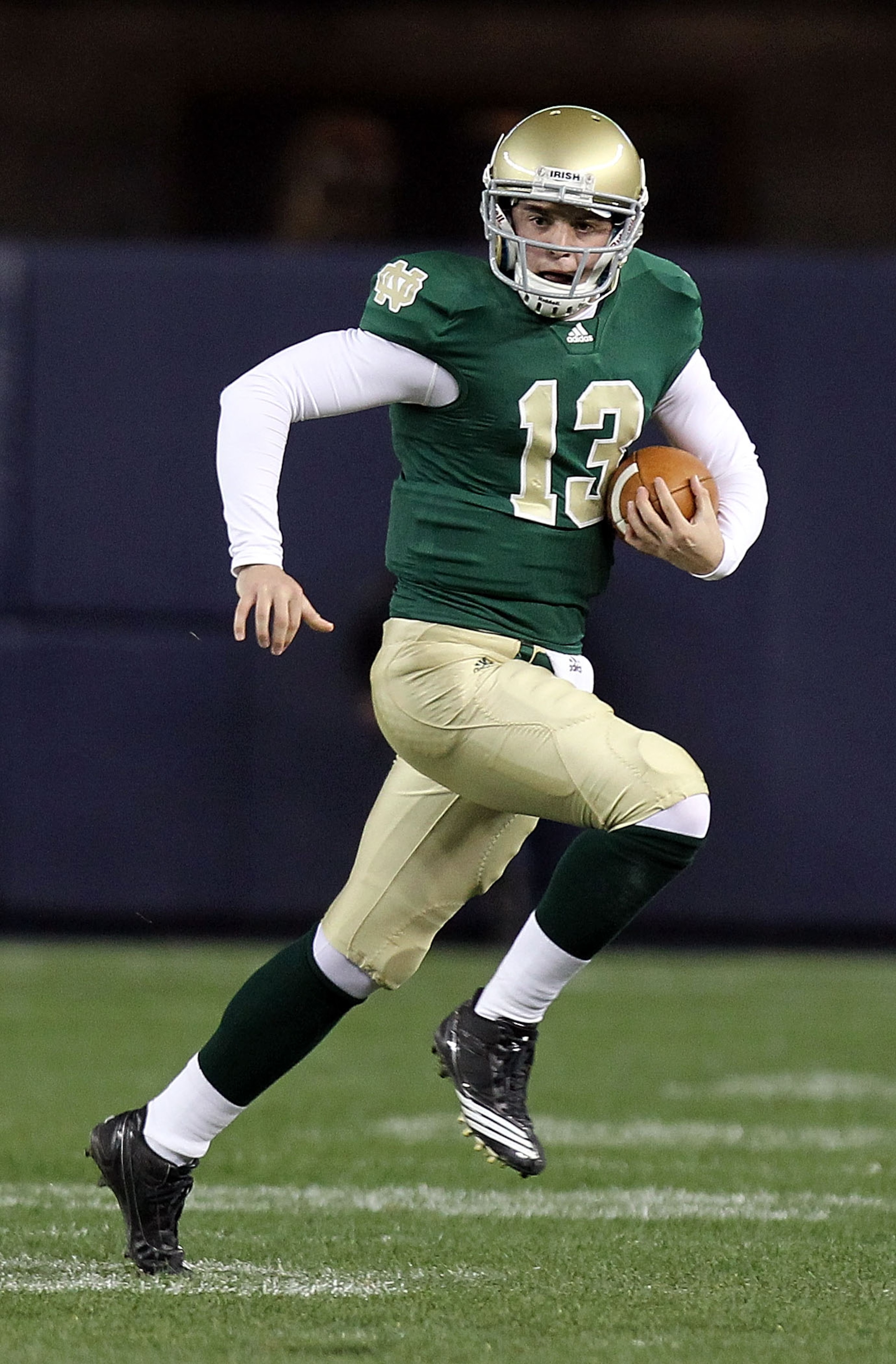 NEW YORK - NOVEMBER 20: Tommy Rees #13 of the Notre Dame Fighting Irish rushes agaisnt the Army Black Knights at Yankee Stadium on November 20, 2010 in the Bronx borough of New York City. (Photo by Nick Laham/Getty Images) NEW YORK - NOVEMBER 20: Tommy Rees #13 of the Notre Dame Fighting Irish rushes agaisnt the Army Black Knights at Yankee Stadium on November 20, 2010 in the Bronx borough of New York City. (Photo by Nick Laham/Getty Images)