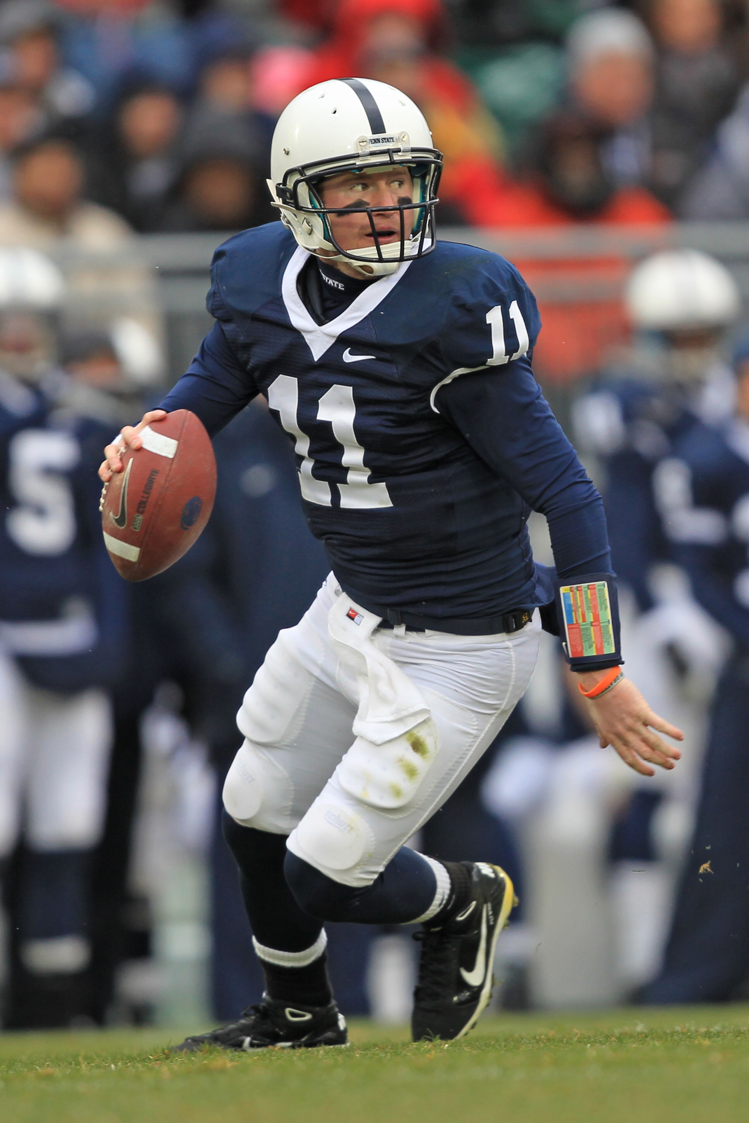 STATE COLLEGE, PA - NOVEMBER 27: Quarterback Matt McGloin #11 of the Penn State Nittany Lions scrambles out of the pocket during a game against the Michigan State Spartans on November 27, 2010 at Beaver Stadium in State College, Pennsylvania. The Spartans STATE COLLEGE, PA - NOVEMBER 27: Quarterback Matt McGloin #11 of the Penn State Nittany Lions scrambles out of the pocket during a game against the Michigan State Spartans on November 27, 2010 at Beaver Stadium in State College, Pennsylvania. The Spartans