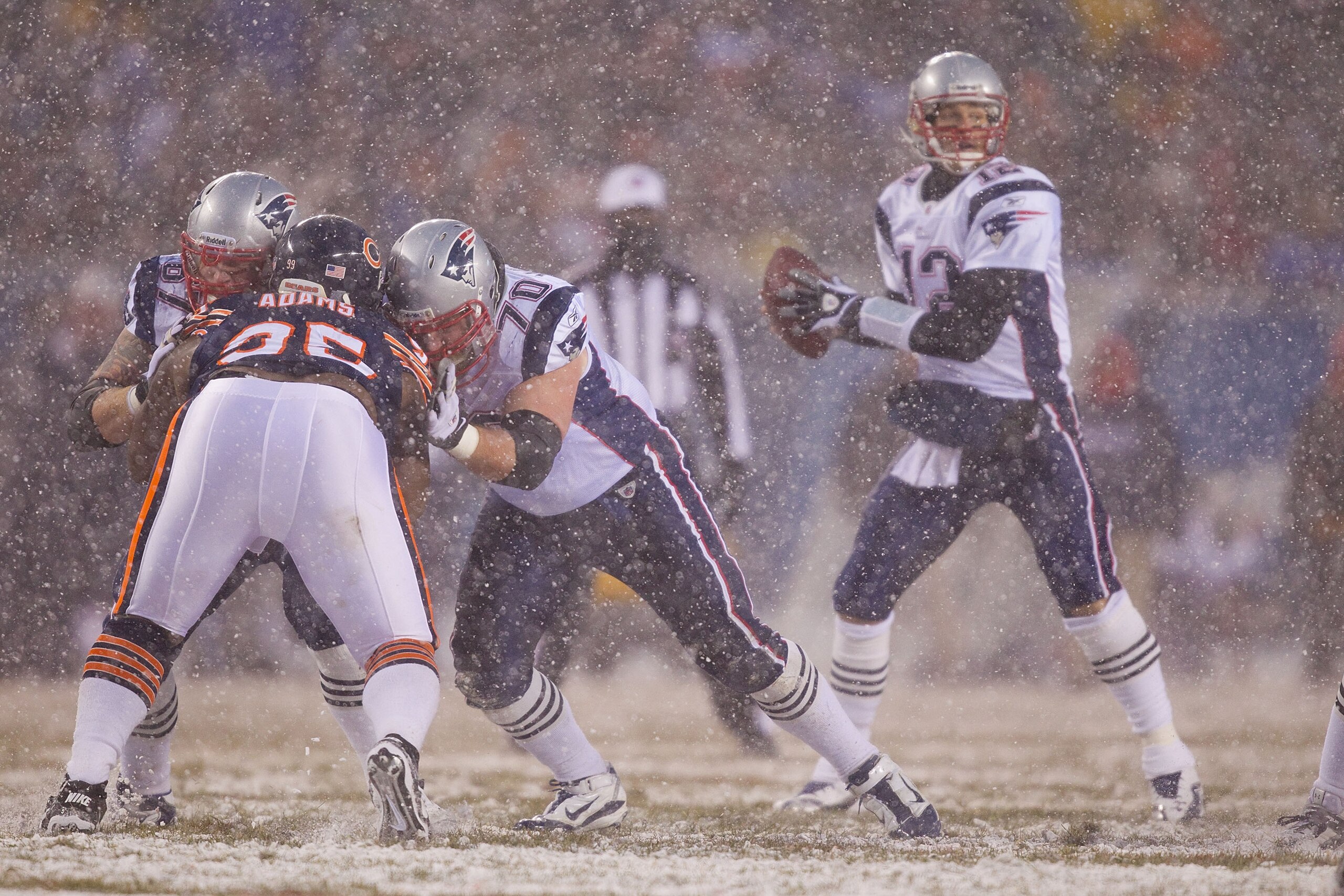 CHICAGO, IL - DECEMBER 12: Dan Koppen #67 and Logan Mankins #70 both of the New England Patriots block against the Chicago Bears at Soldier Field on December 12, 2010 in Chicago, Illinois. The Patriots beat the Bears 36-7. (Photo by Dilip Vishwanat/Gett CHICAGO, IL - DECEMBER 12: Dan Koppen #67 and Logan Mankins #70 both of the New England Patriots block against the Chicago Bears at Soldier Field on December 12, 2010 in Chicago, Illinois. The Patriots beat the Bears 36-7. (Photo by Dilip Vishwanat/Gett