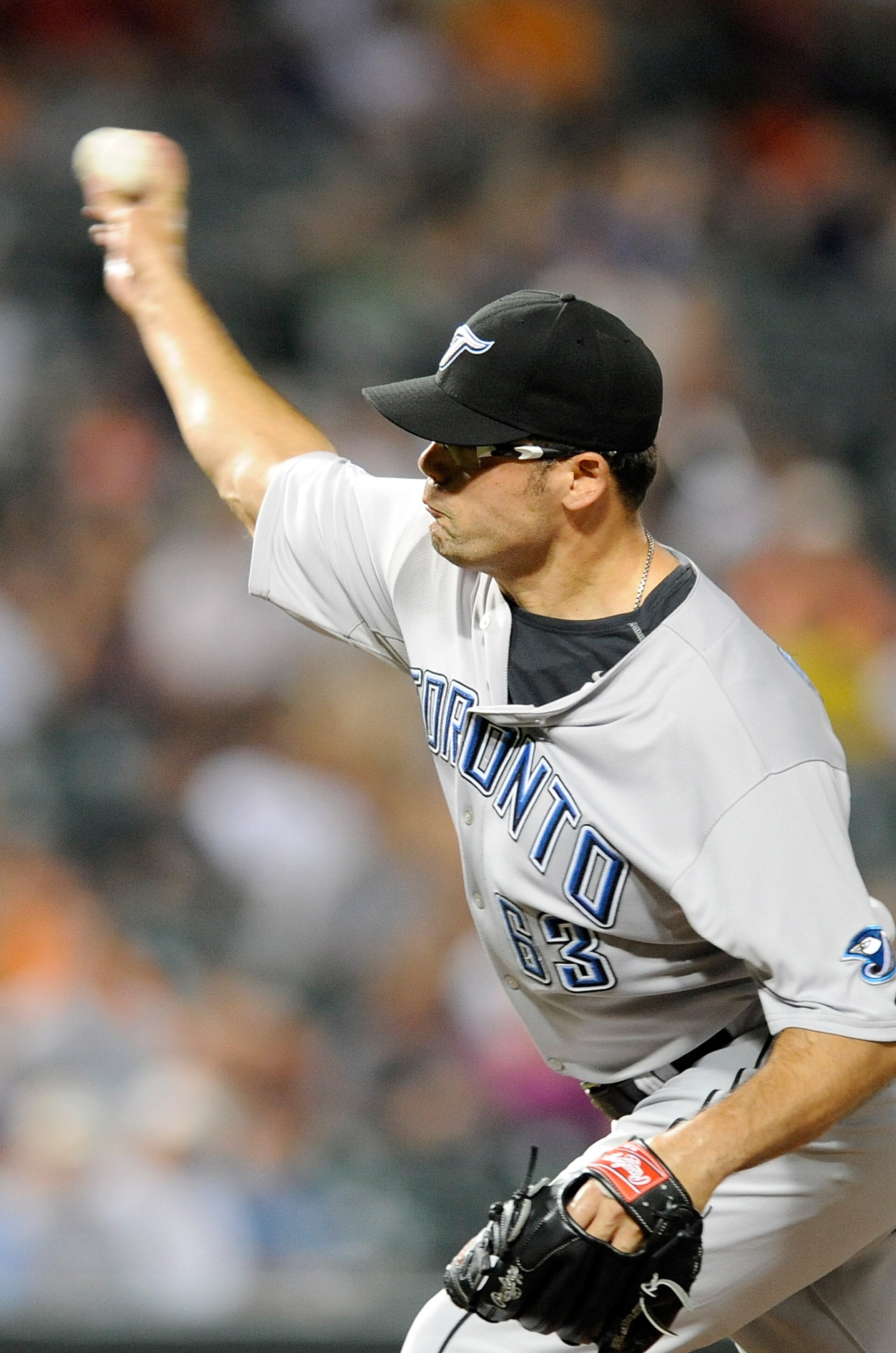 BALTIMORE - JULY 16:  Kevin Gregg #63 of the Toronto Blue Jays pitches against the Baltimore Orioles at Camden Yards on July 16, 2010 in Baltimore, Maryland.  (Photo by Greg Fiume/Getty Images)