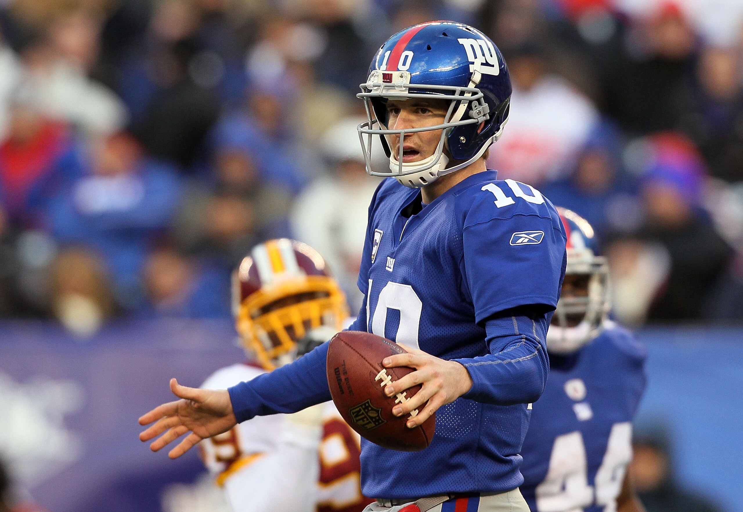EAST RUTHERFORD, NJ - DECEMBER 05: Eli Manning #10 of the New York Giants fires looks on against the Washington Redskins on December 5, 2010 at the New Meadowlands Stadium in East Rutherford, New Jersey. The Giants defeated the Redskins 31-7. (Photo by EAST RUTHERFORD, NJ - DECEMBER 05: Eli Manning #10 of the New York Giants fires looks on against the Washington Redskins on December 5, 2010 at the New Meadowlands Stadium in East Rutherford, New Jersey. The Giants defeated the Redskins 31-7. (Photo by